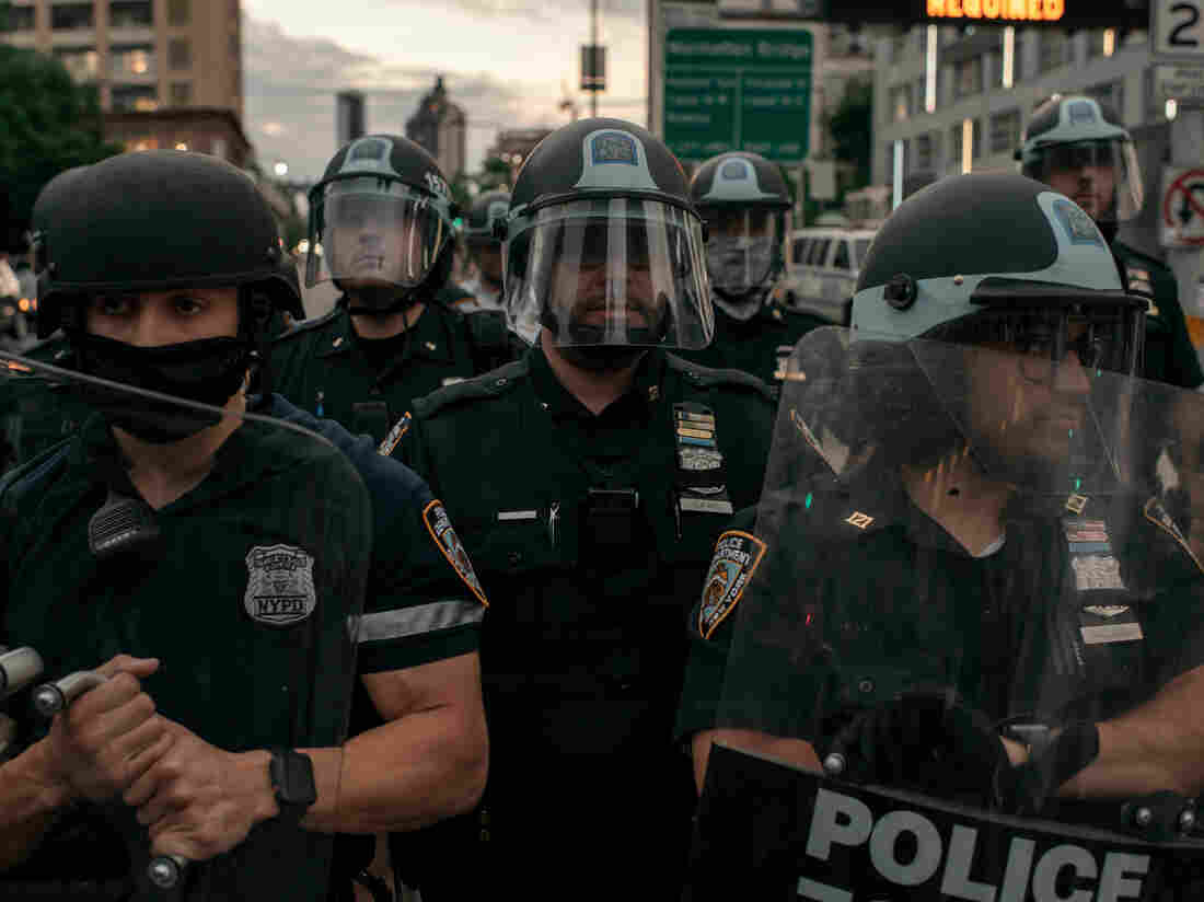 NEW YORK, NY - JUNE 02: NYPD officers block the entrance of the Manhattan Bridge as hundreds protesting police brutality and systemic racism attempt to cross into the borough of Manhattan from Brooklyn after a citywide curfew went into effect in New York City. (Photo by Scott Heins/Getty Images)