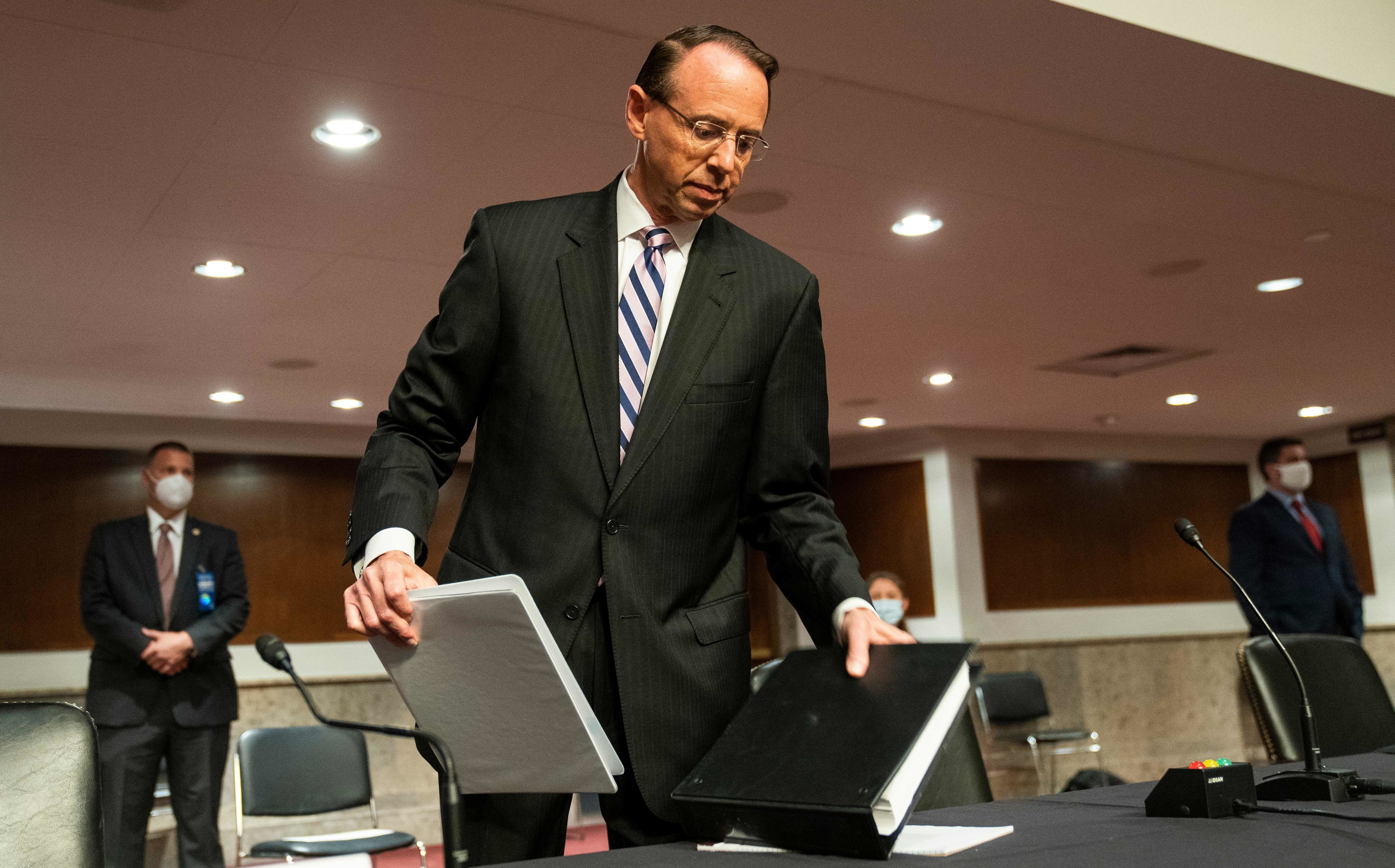 Former Deputy Attorney General Rod Rosenstein arrives to testify before a Republican-led Senate Judiciary Committee hearing on &quot;Crossfire Hurricane,&quot; the FBI's probe into Russian election interference and the 2016 Trump campaign on Wednesday. (Pool/AFP via Getty Images)