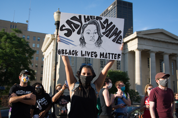 Marissa Pantoja, 23, made this protest sign as a tribute to Taylor. "I think the biggest thing that hit home was that she was an essential worker," Pantoja says. "I want to make sure her name is never forgotten."