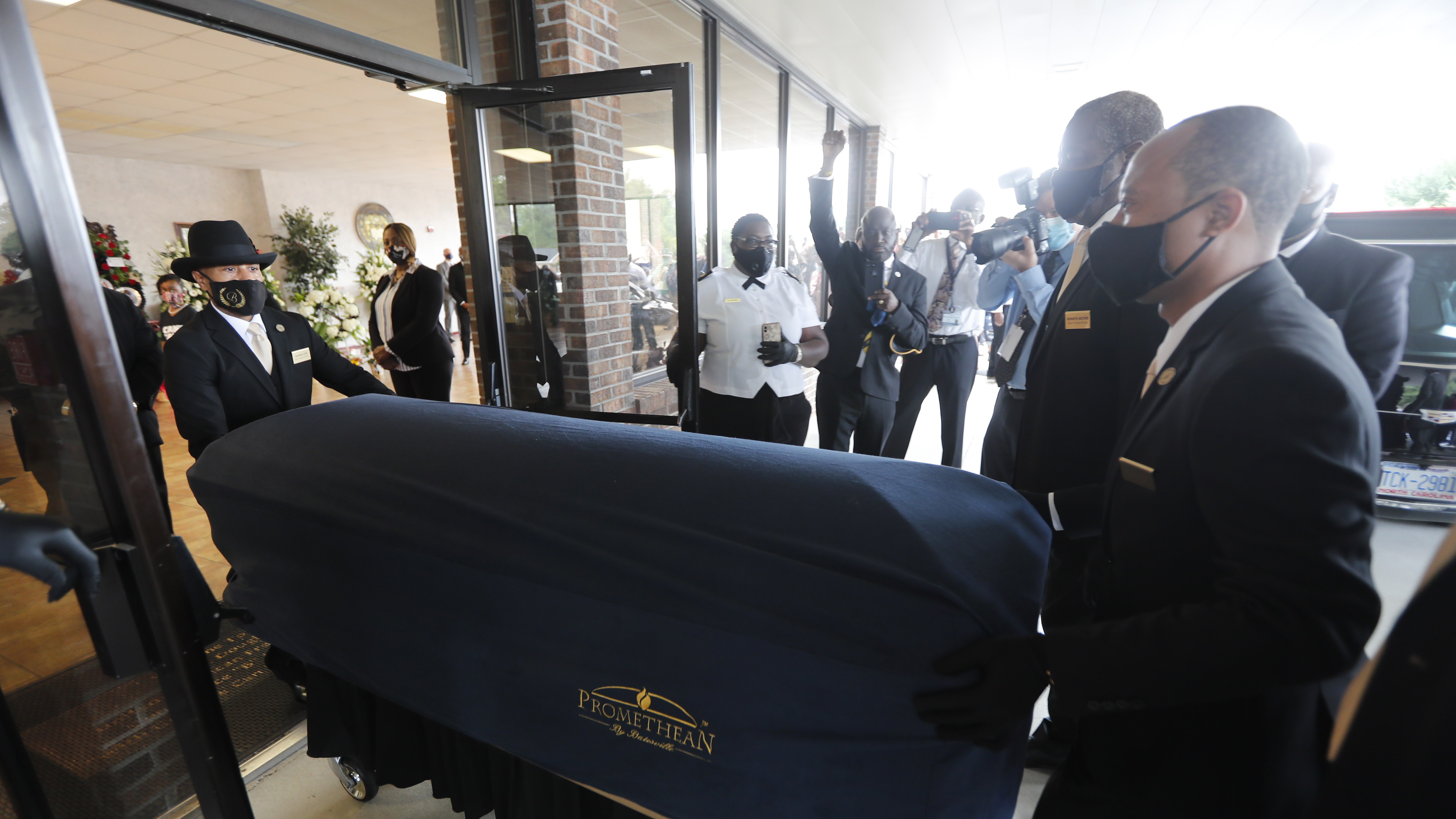 The casket of George Floyd arrives Saturday in Raeford, N.C. Floyd was called a gentle giant.