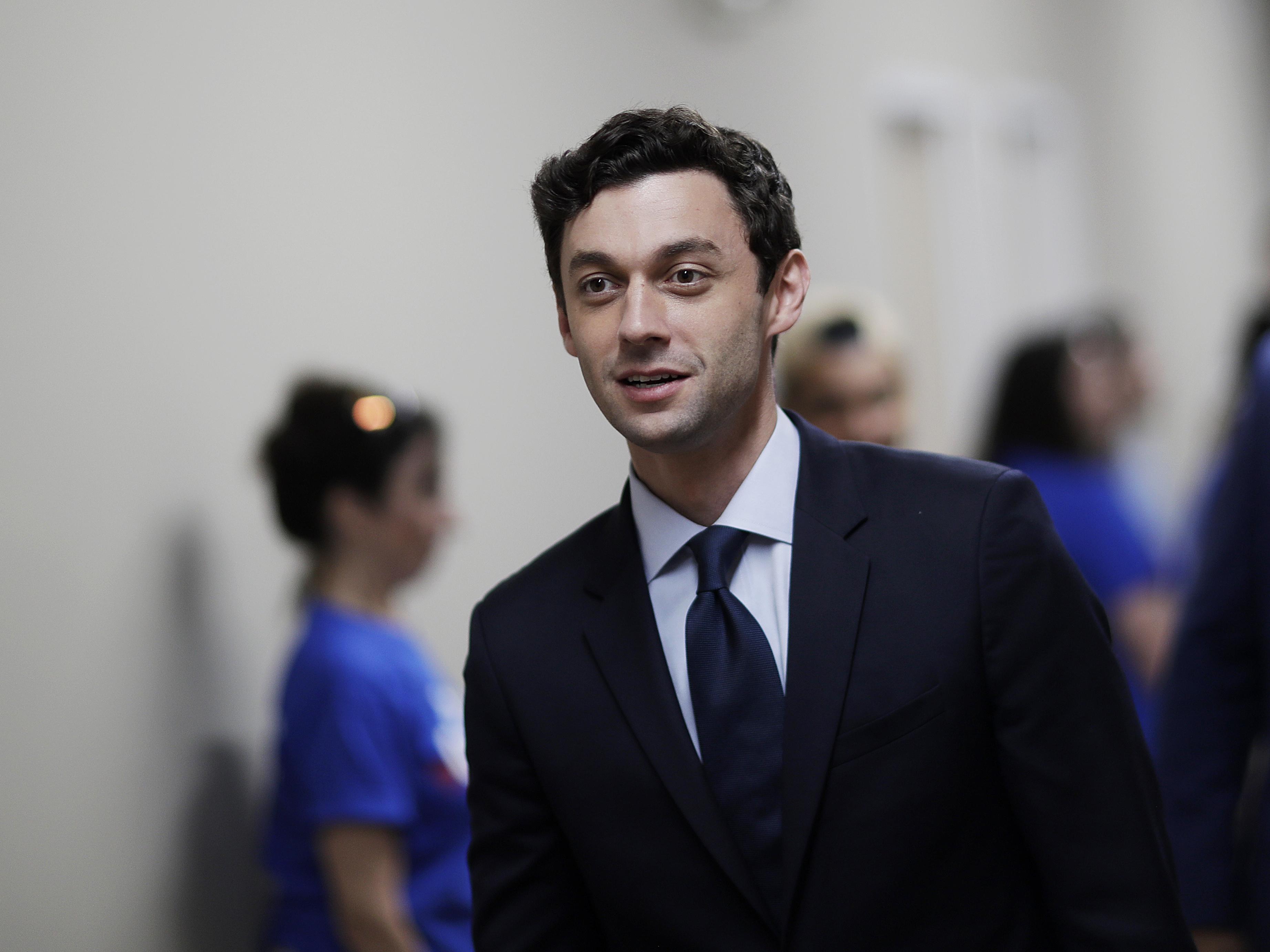 Jon Ossoff leaves a campaign office during a 2017 race after meeting with supporters in Marietta, Ga. Ossoff will face Republican Sen. David Perdue in November. (AP)
