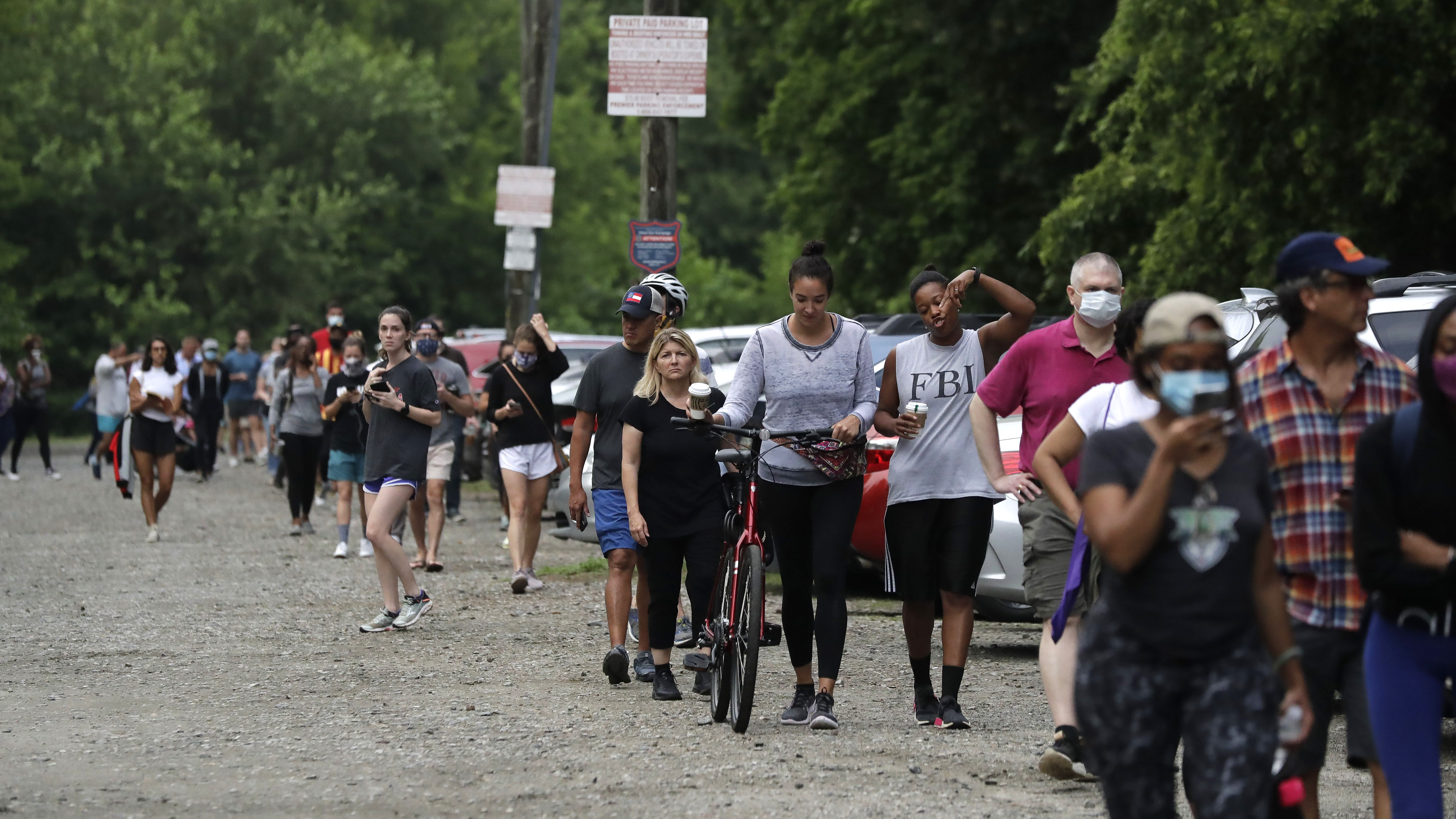 People wait in line to vote in the Georgia's primary election at Park Tavern in Atlanta on Tuesday. (AP)