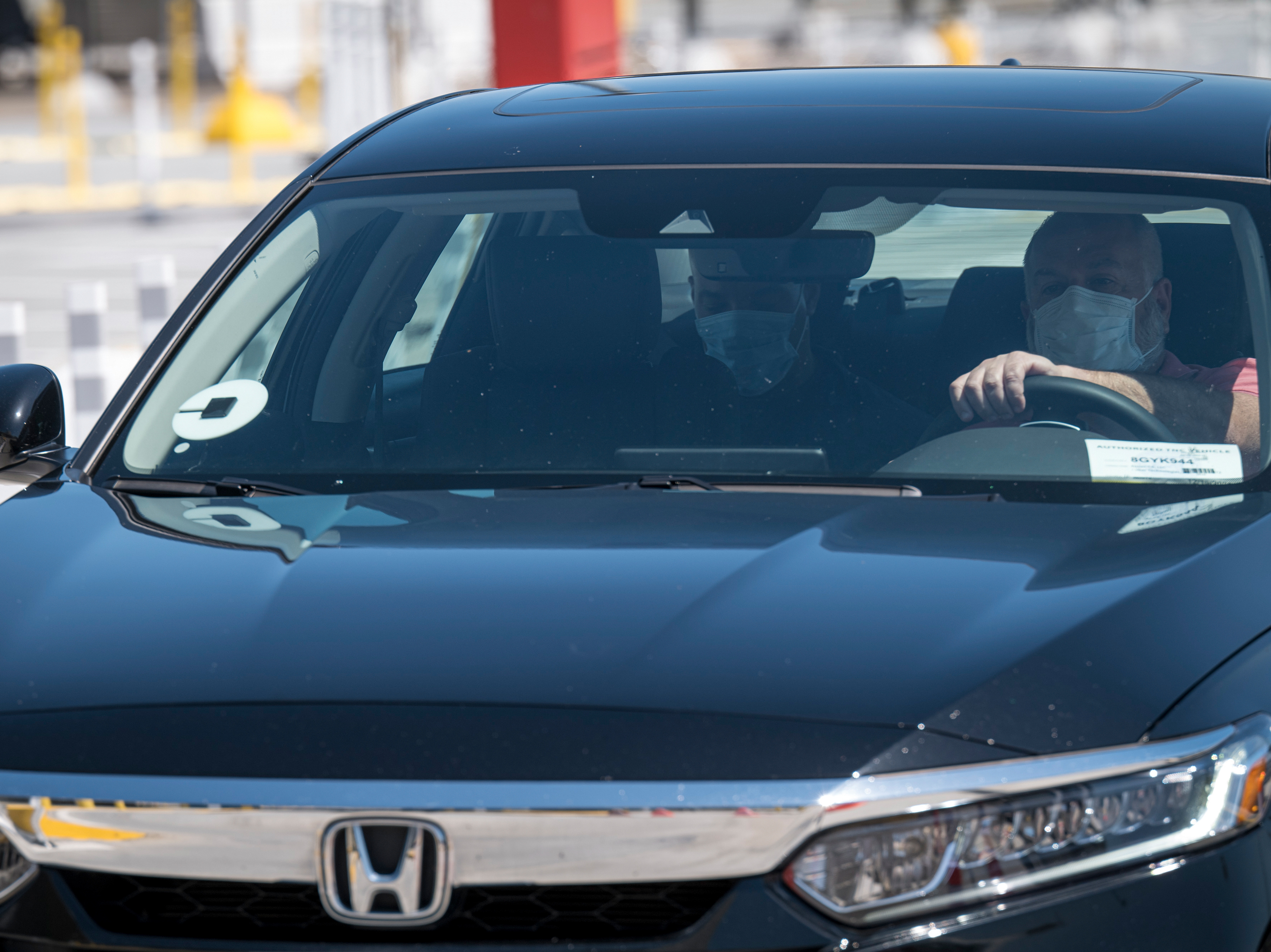 After months of shutdowns that have damaged the ride-hailing industry, Uber says it sees signs of revival. (Bloomberg via Getty Images)