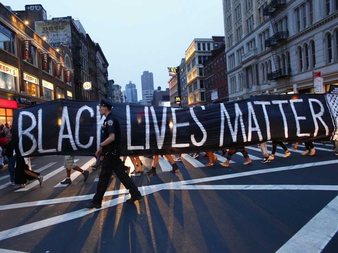 A police officer patrols during a protest in support of the Black Lives Matter movement in New York City on July 9.