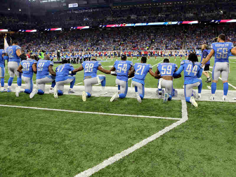 Members of the Detroit Lions take a knee during the playing of the national anthem prior to the start of the game at Ford Field on September 24, 2017 in Detroit, Michigan.