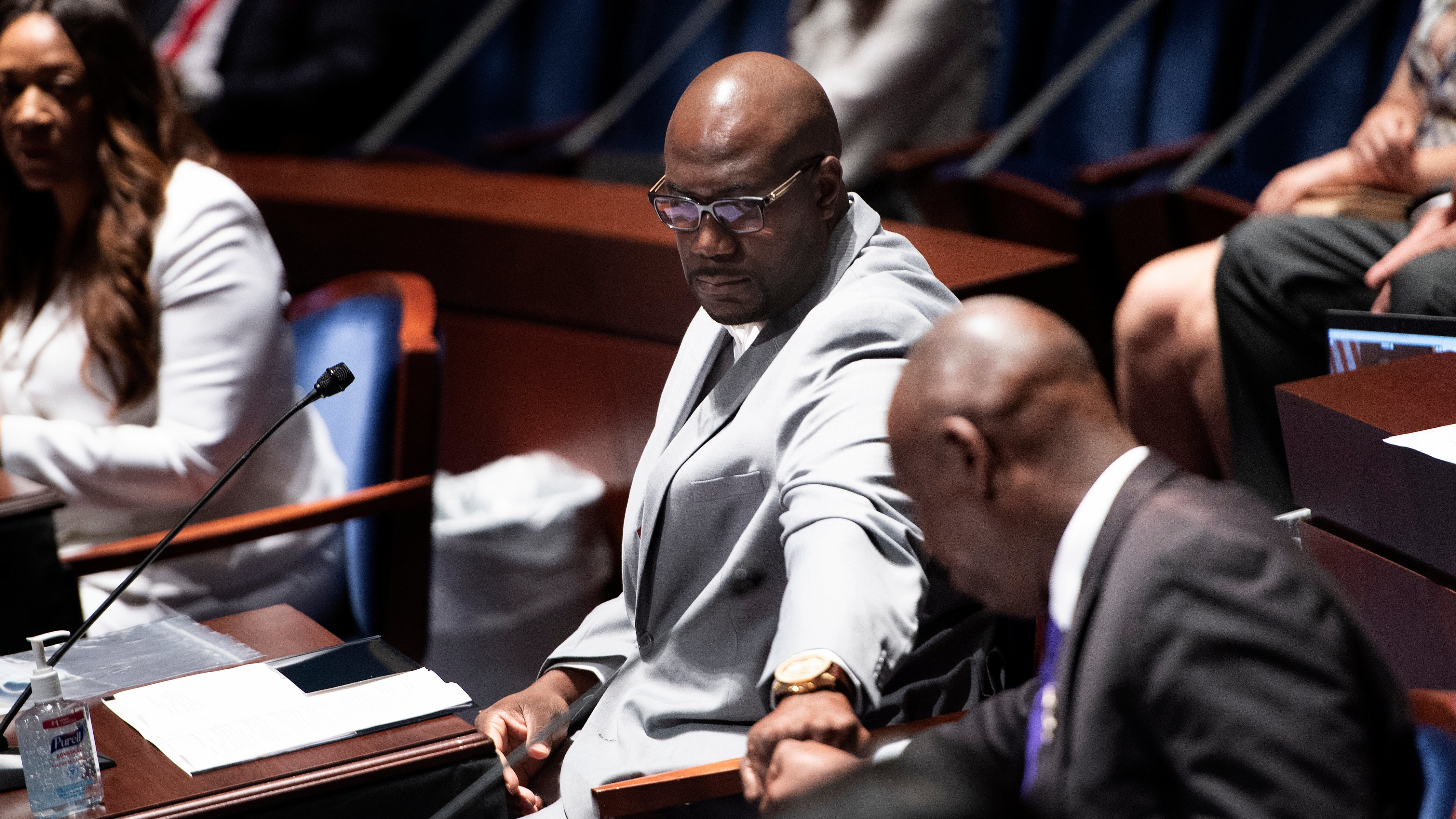 Philonise Floyd (left), brother of George Floyd, fist-bumps Ben Crump, civil rights attorney representing the Floyd family, after speaking during a hearing on Capitol Hill on Wednesday. (Pool/AFP via Getty Images)