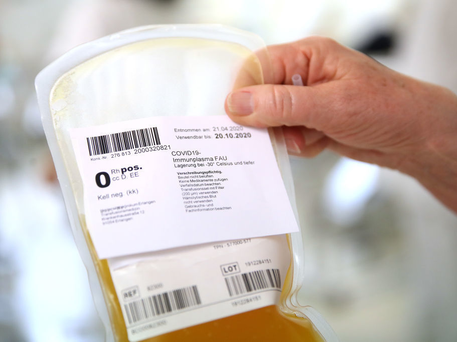 A researcher at the German Center for Immunity Therapy holds a bag containing blood plasma from a recovered COVID-19 patient at the University Hospital Erlangen on April 27, 2020 in Erlangen, Germany. This plasma could be used to treat people with COVID-19. (Getty Images)