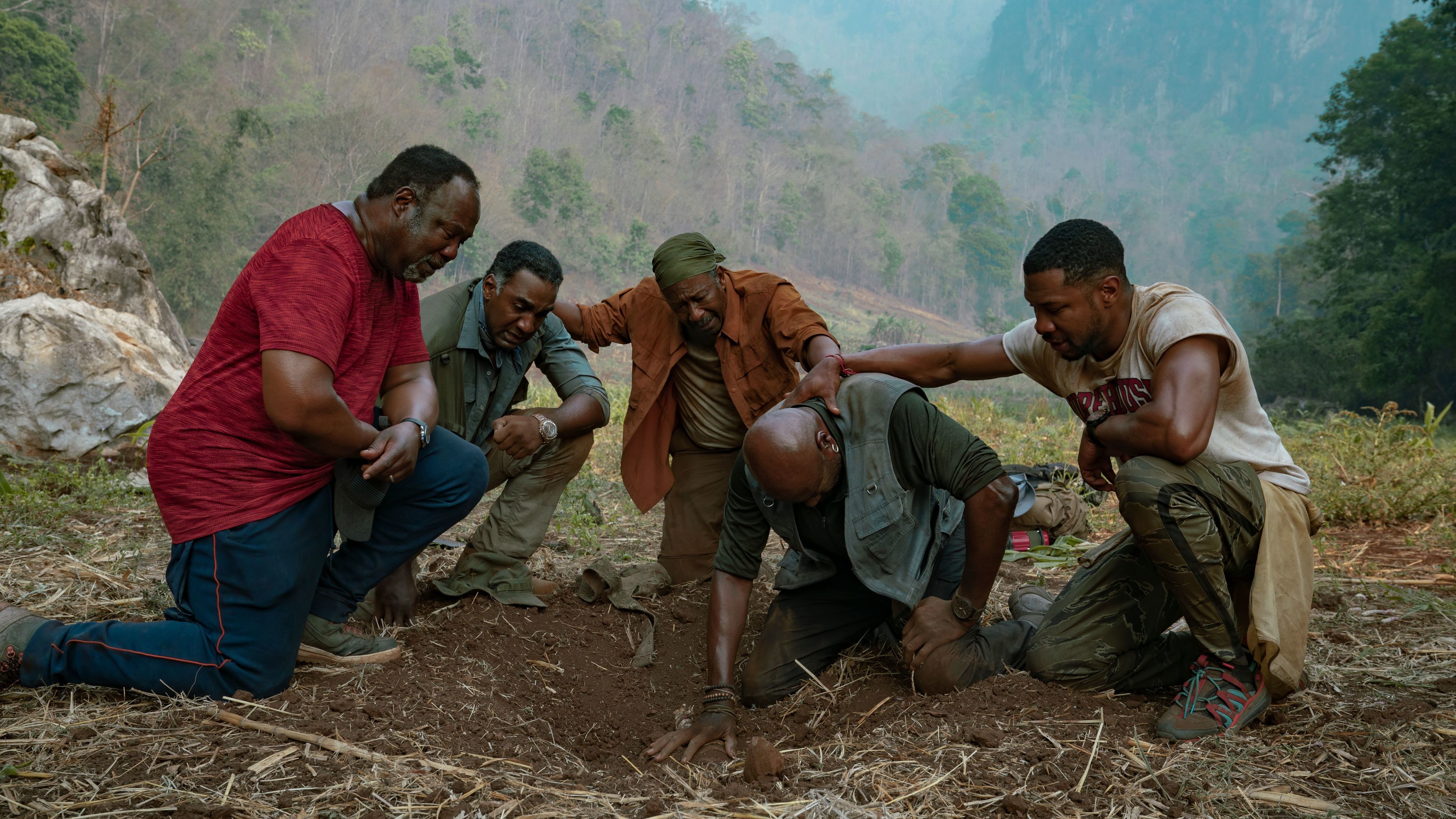 Four black war veterans (Isiah Whitlock Jr., Norm Lewis, Clarke Peters and Delroy Lindo) and one veteran's son (Jonathan Majors) return to Vietnam in <em>Da 5 Bloods.</em> (Netflix)
