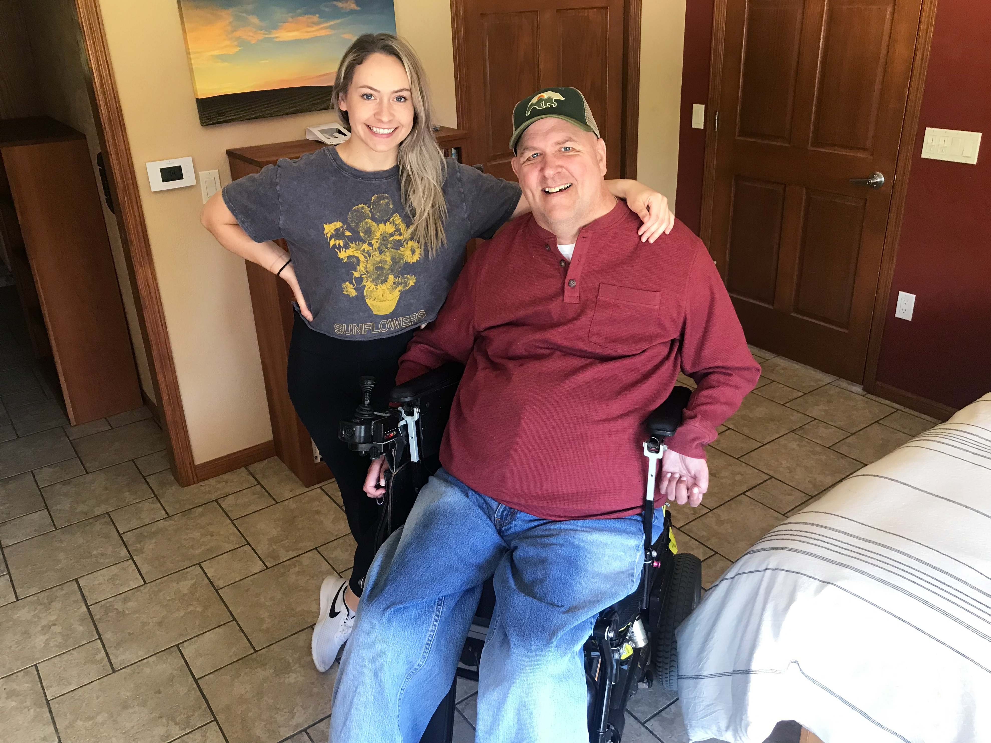 Matt Ford is seen in Verona, Wis., with one of his caregivers, Grace Brunette. An accident in 1987 left Ford paralyzed in all four limbs. He needs help getting in and out of bed, preparing meals, using the bathroom and driving. Brunette recently finished a physician assistant program at the UW-Madison School of Medicine and Public Health. (Matt Ford)
