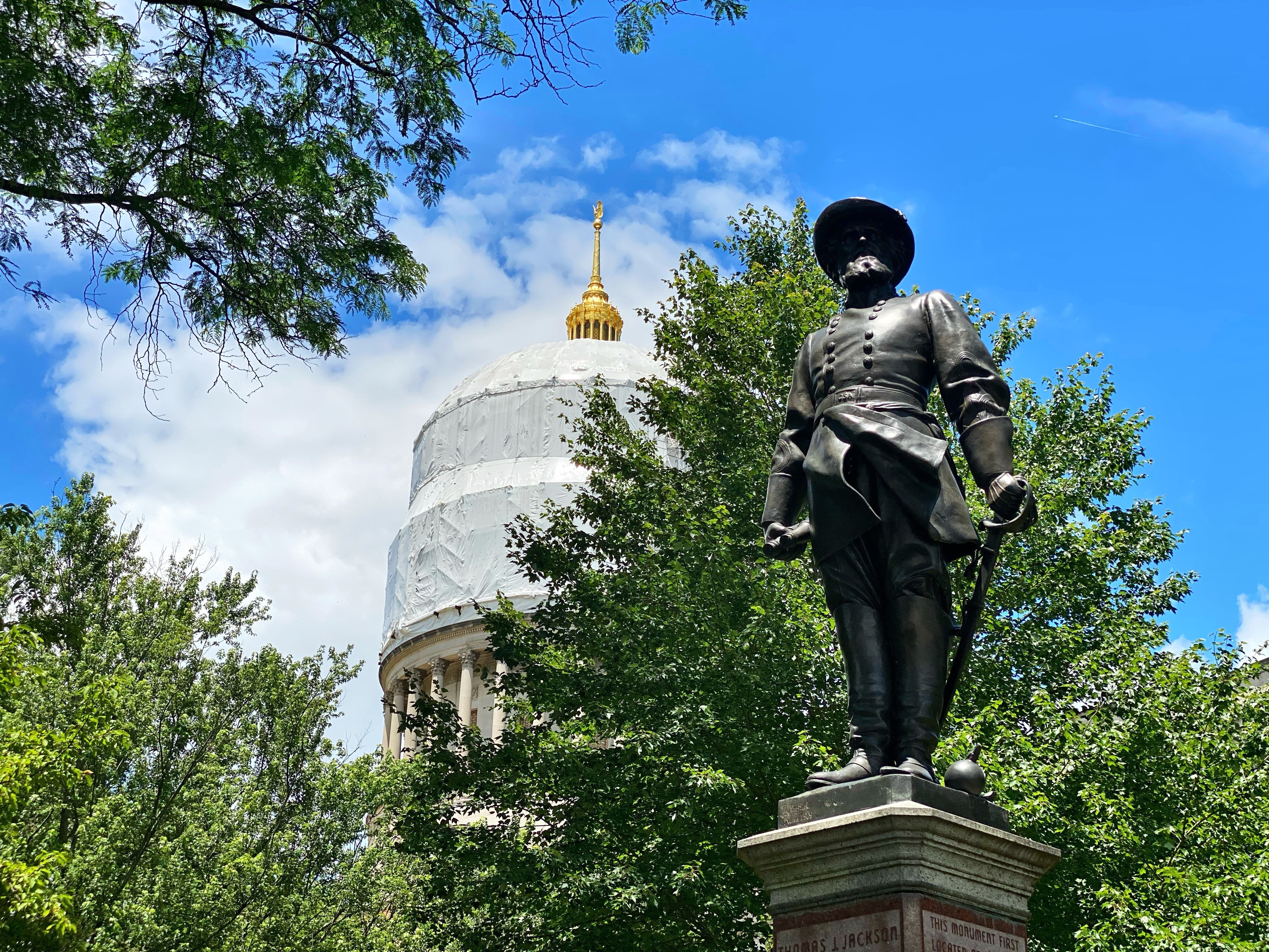 A statue of Confederate Gen. Stonewall Jackson stands tall on the grounds of the West Virginia Capitol building in Charleston. (West Virginia Public Broadcasting)