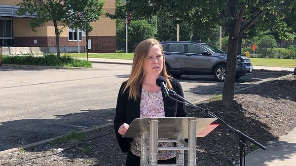 Minneapolis attorney Bonnie Smith, who is representing eight correctional officers in a discrimination case against the Ramsey County jail, speaks outside the facility in St. Paul, Minn., on Sunday.