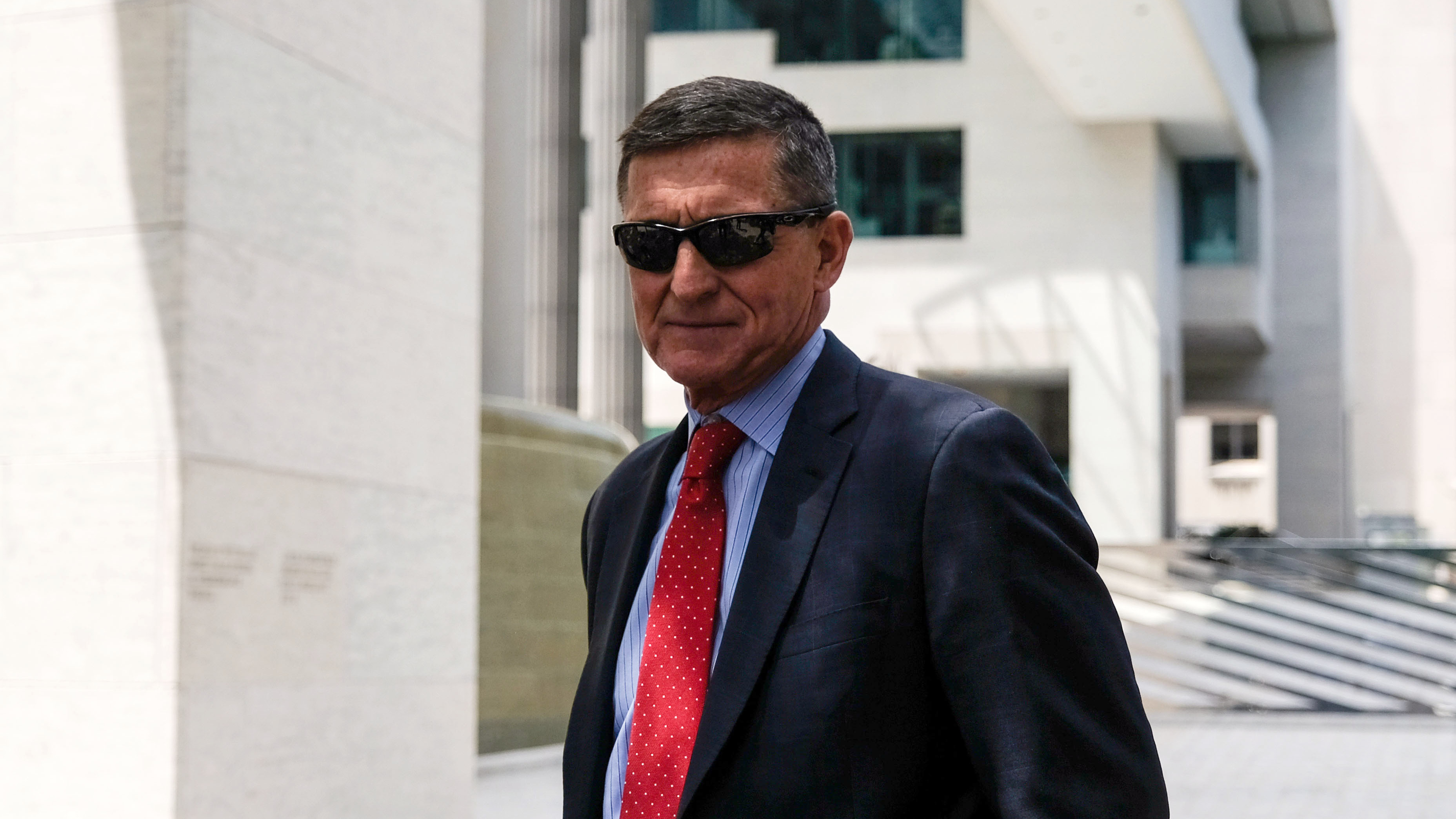 Michael Flynn, President Trump's former national security adviser, leaves the E. Barrett Prettyman U.S. Courthouse in June 2019 in Washington, D.C. An appeals court has ordered a judge to drop the case against him, as the Justice Department has requested. (Getty Images)