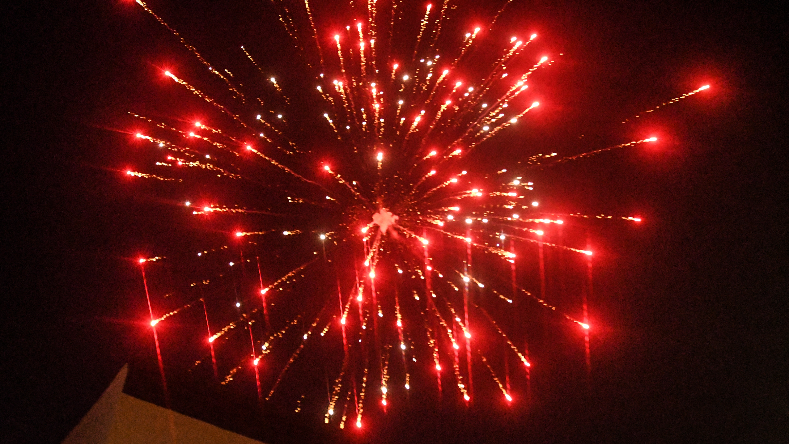 A fireworks display rises above an empty park on Wednesday in Brooklyn. According to New York City officials, complaints about fireworks have skyrocketed in recent weeks.