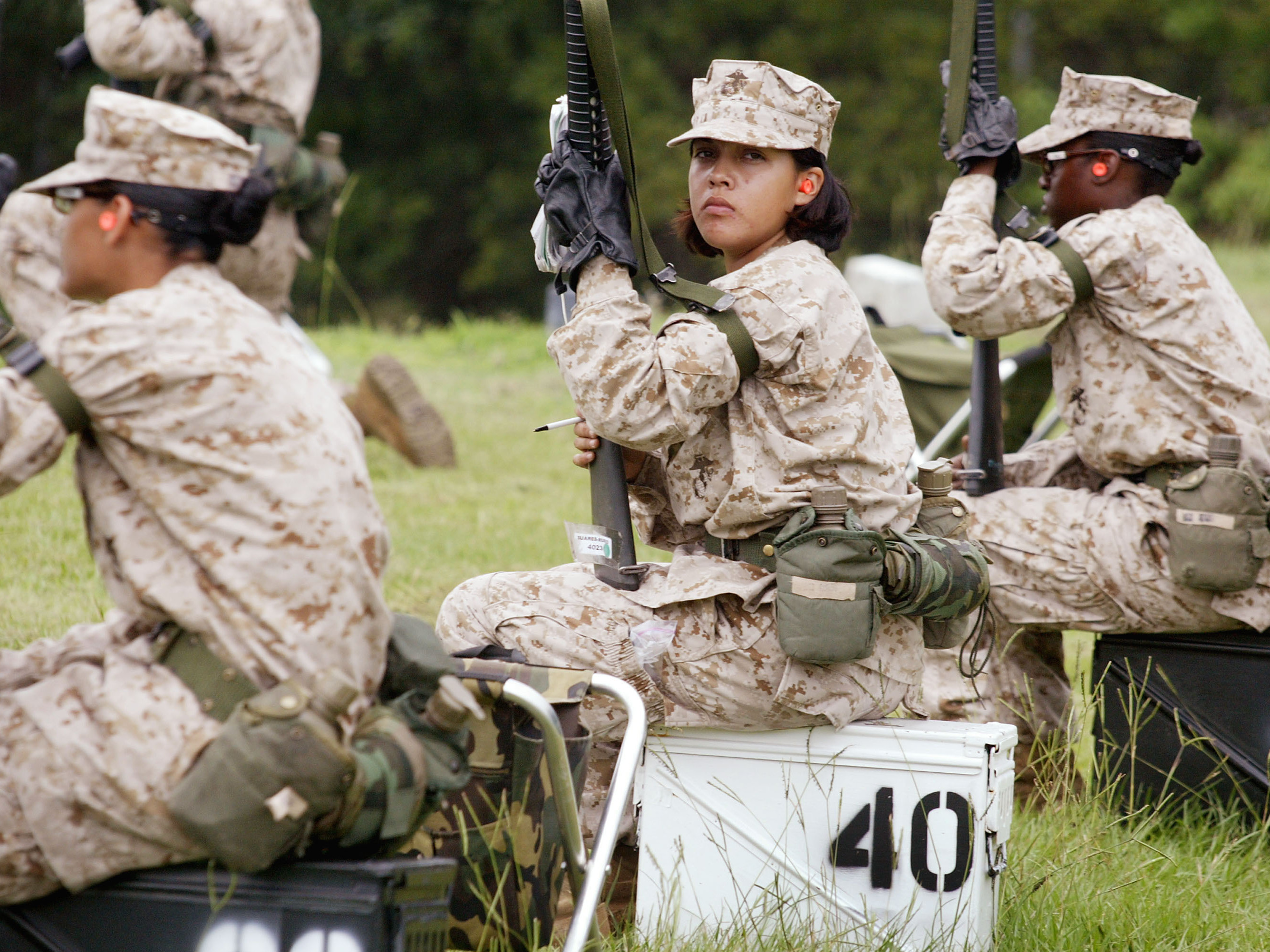Female Marine Corps recruits train at the United States Marine Corps recruit depot June 21, 2004, in Parris Island, South Carolina. Some House Democrats and many veterans want the service of women and of all vets to be recognized in an updated motto for the Department of Veterans Affairs. (Getty Images)