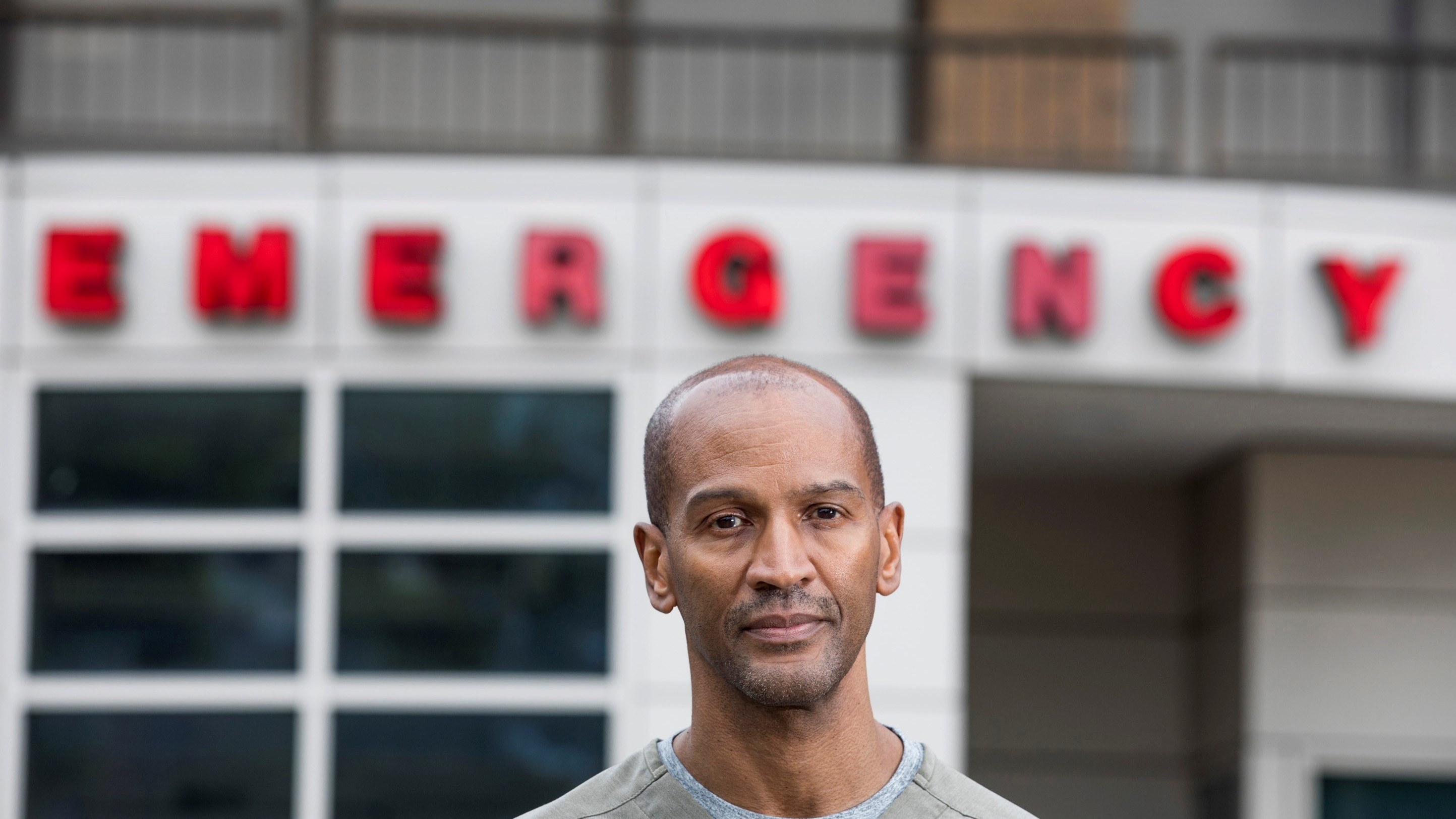 Dr. William Strudwick stands outside Howard University Hospital, where he works as an attending physician in the emergency department.