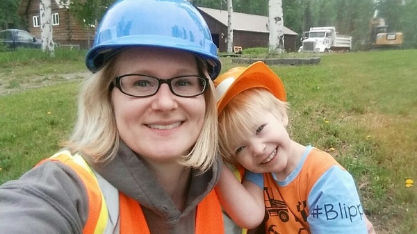 Mamie Brown, a lawyer in Fairbanks, Alaska, takes a selfie with her son, Edward. She has found herself squeezed between work and caring for her two kids during the coronavirus pandemic.