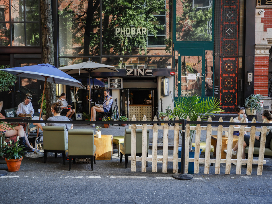 Across the country, restaurants can operate with various restrictions, like outdoor-only seating and capacity limits. New York City began Phase 2 on June 22, allowing outdoor dining to reopen. (John Minchillo/AP)