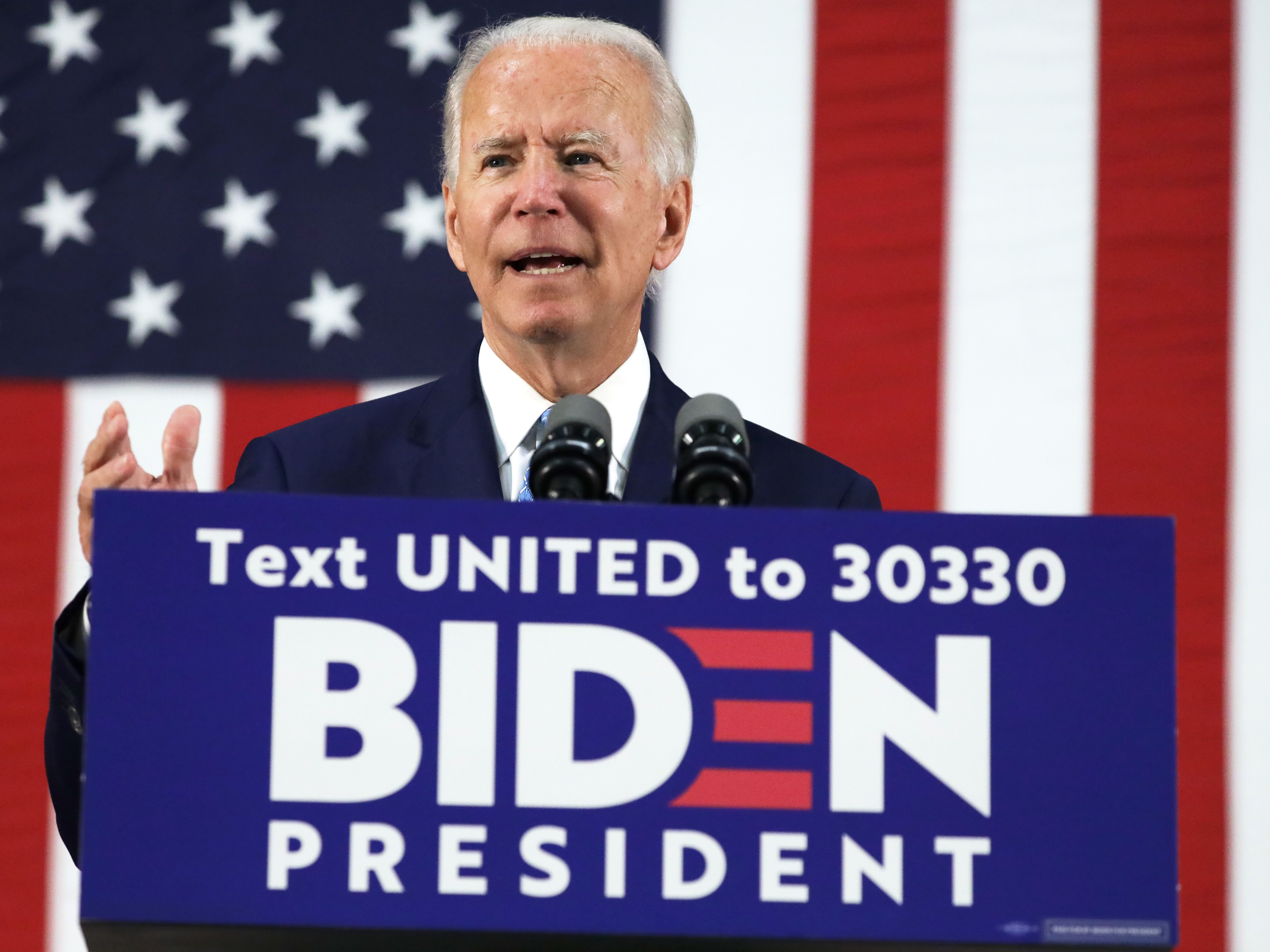 Presumptive Democratic presidential nominee Joe Biden harshly criticizes President Trump's response to the coronavirus pandemic in remarks Tuesday at Alexis duPont High School in Wilmington, Del. (Getty Images)