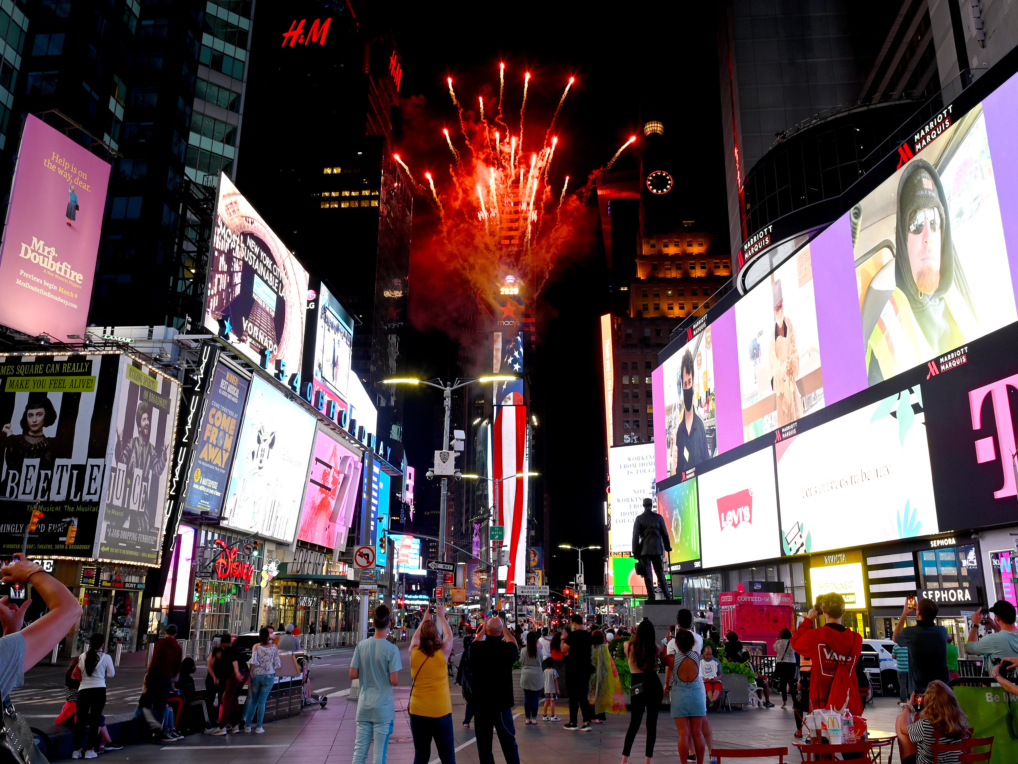 A view of fireworks over Times Square on July 1 in New York City. This is the third of six July Fourth firework displays in locations around the city that are kept secret in an attempt to minimize crowds gathering in the midst of the coronavirus pandemic. (Getty Images)