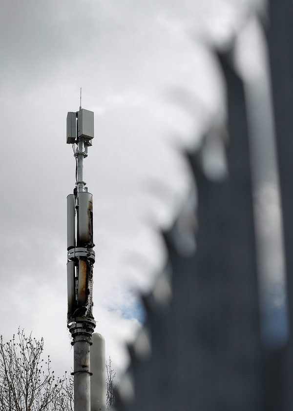 A fire-damaged telecom tower stands in Birmingham, U.K., on Monday, April 6, 2020. Telecom towers that enable 5G wireless communication were set on fire in the U.K., apparently by people motivated by a theory that the technology helps spread the coronavirus.