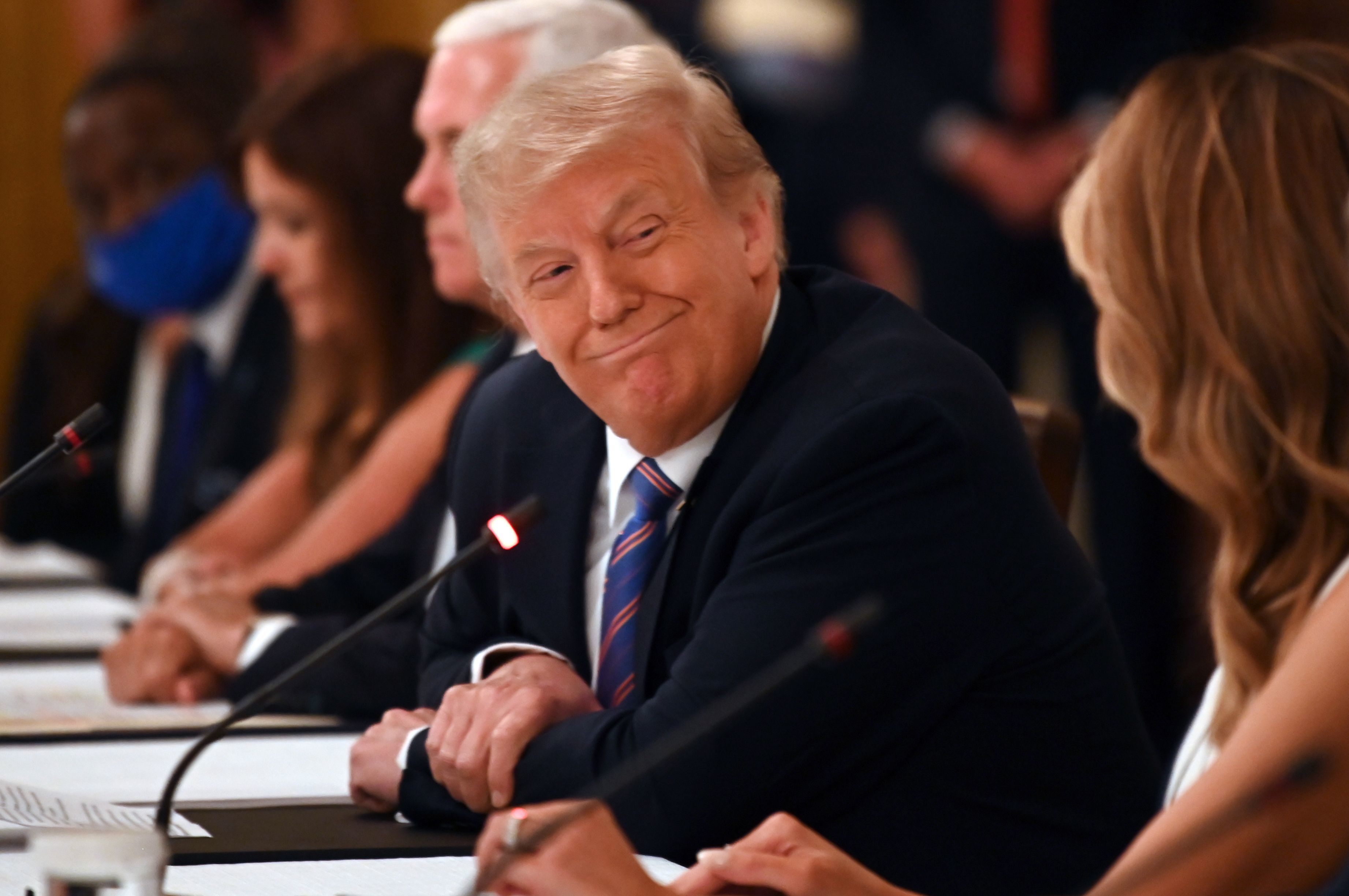 President Trump, seen here at a roundtable discussion at the White House on Tuesday, rebuked the CDC for its guidelines on reopening schools in a tweet Wednesday. (AFP via Getty Images)