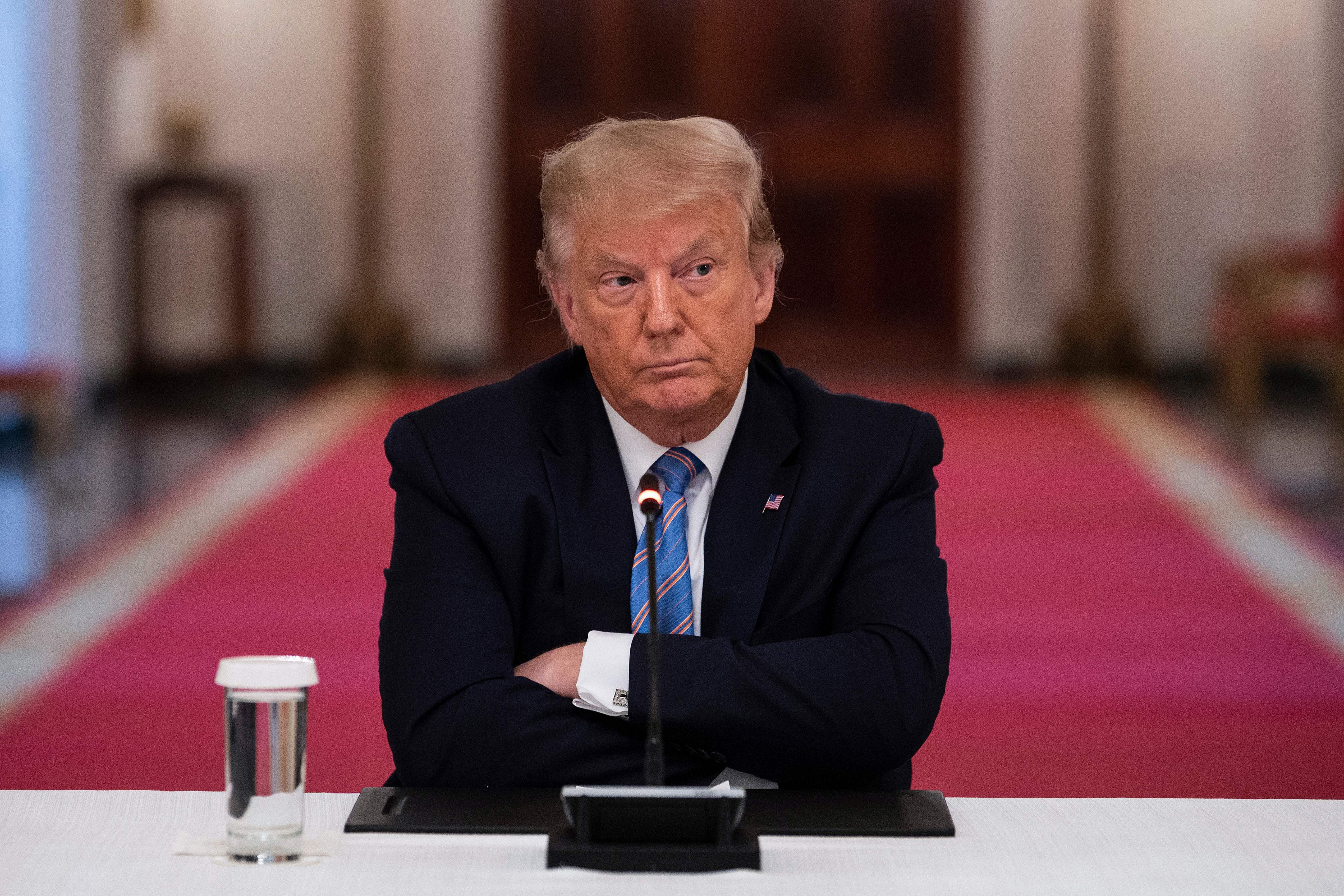 President Trump participates in a White House event Tuesday on how to reopen schools safely. After insisting that the Republican National Convention should be in person with thousands of people, Trump said he is &quot;flexible&quot; about the format. (AFP via Getty Images)