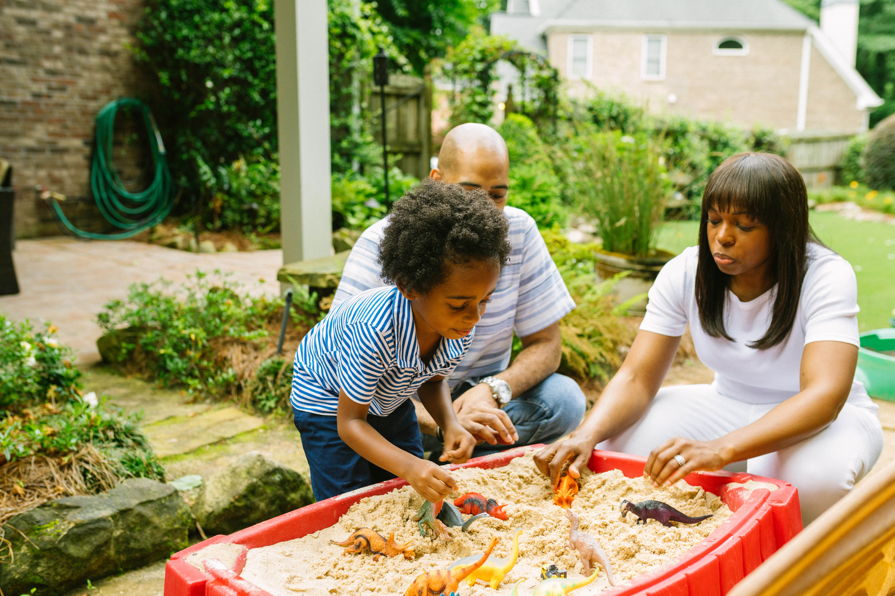 Spending quality time with kids and listening deeply to them is one way to help them tame anxiety. Here Mariano Noesi and Maryam Jernigan-Noesi play with their 4-year-old son Carter.  Jernigan-Noesi is a child psychologist. (Lynsey Weatherspoon for NPR)