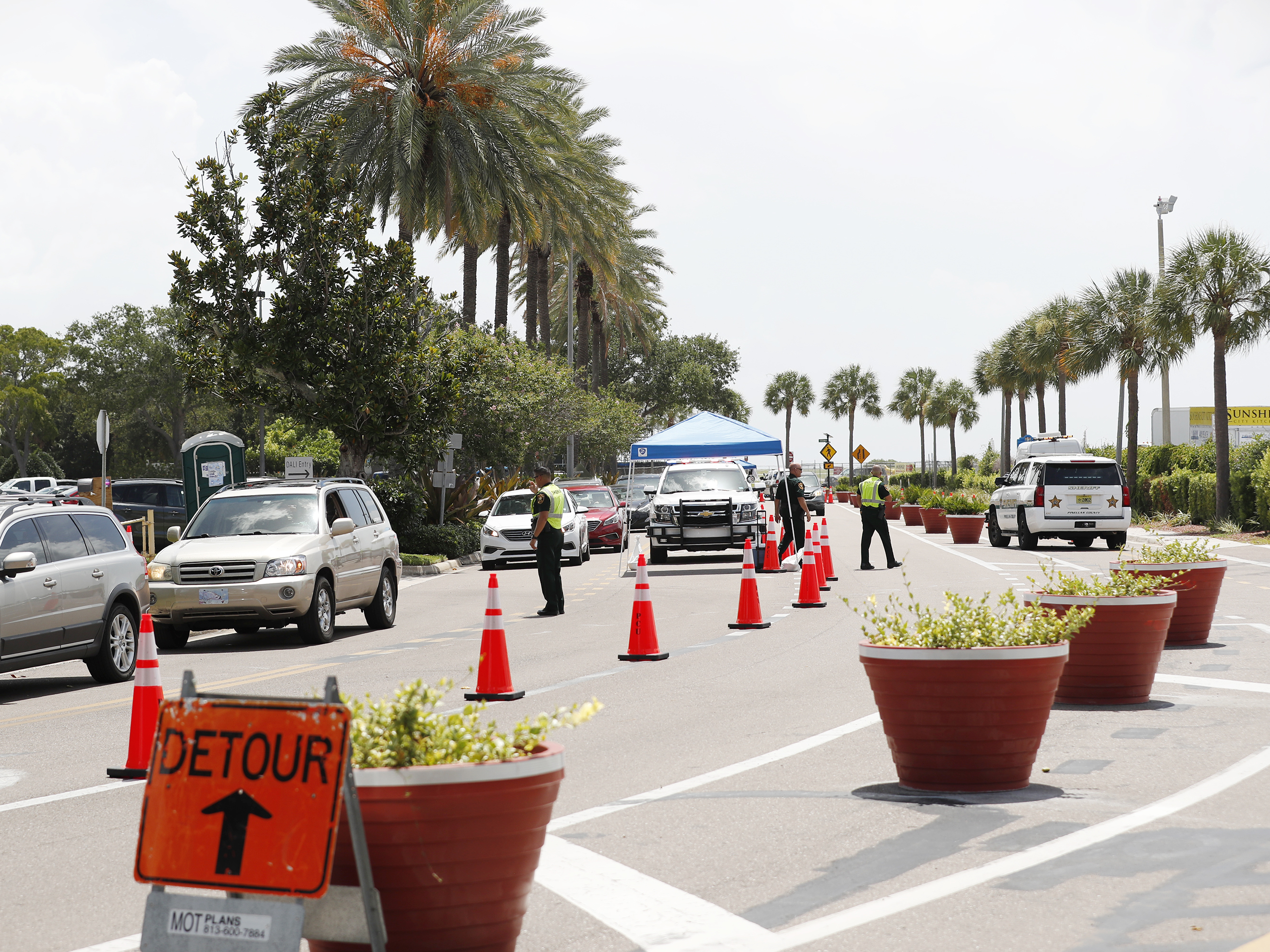 Cars line up for drive-through coronavirus testing in St. Petersburg, Florida. The state reported a record-breaking 15,299 new cases on Sunday. (Getty Images)