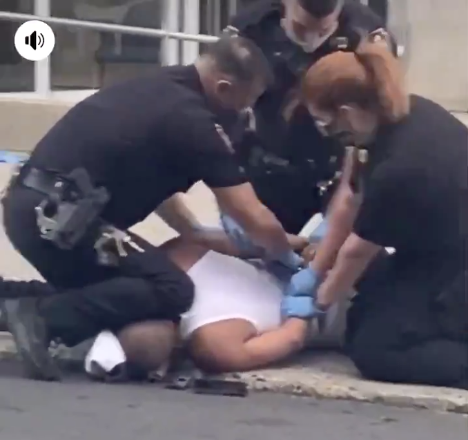 Police investigate incident where officer appeared to use knee to restrain suspect 