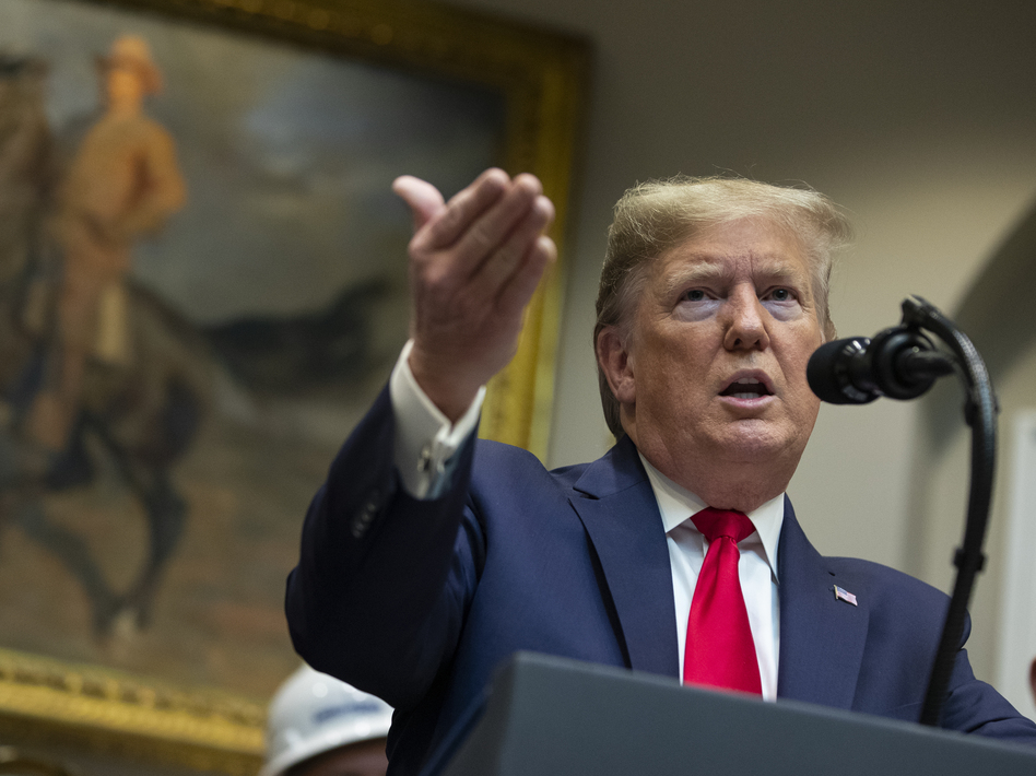 President Trump proposes changes to the National Environmental Policy Act at the White House in January. The final rules aims to speed approval of pipelines and other infrastructure. (Evan Vucci/AP)