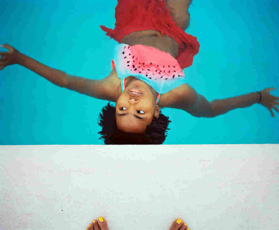Thandi floating in the pool.