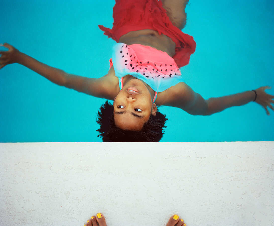 Thandi floating in the pool.