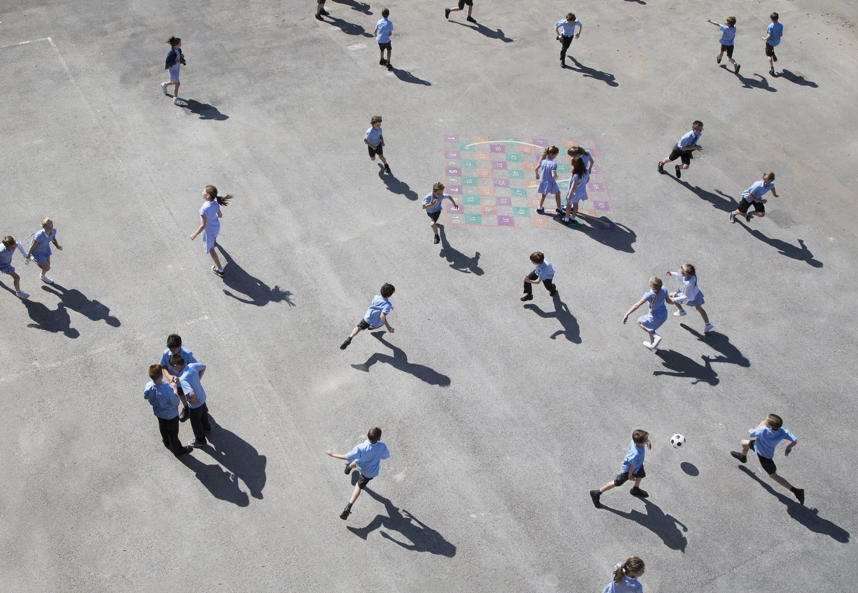 Research suggests that kids tend to get infected with the coronavirus less often, and have milder symptoms than adults. There's less consensus on how much kids can spread the illness. (Getty Images)