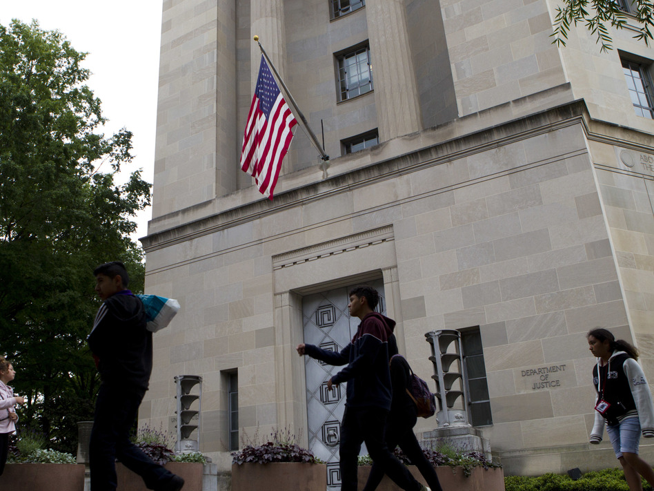The Department of Justice is marking 150 years this month and some former employees and officials say the time has come for reforms in its relationship with the White House. (Jose Luis Magana/AP)