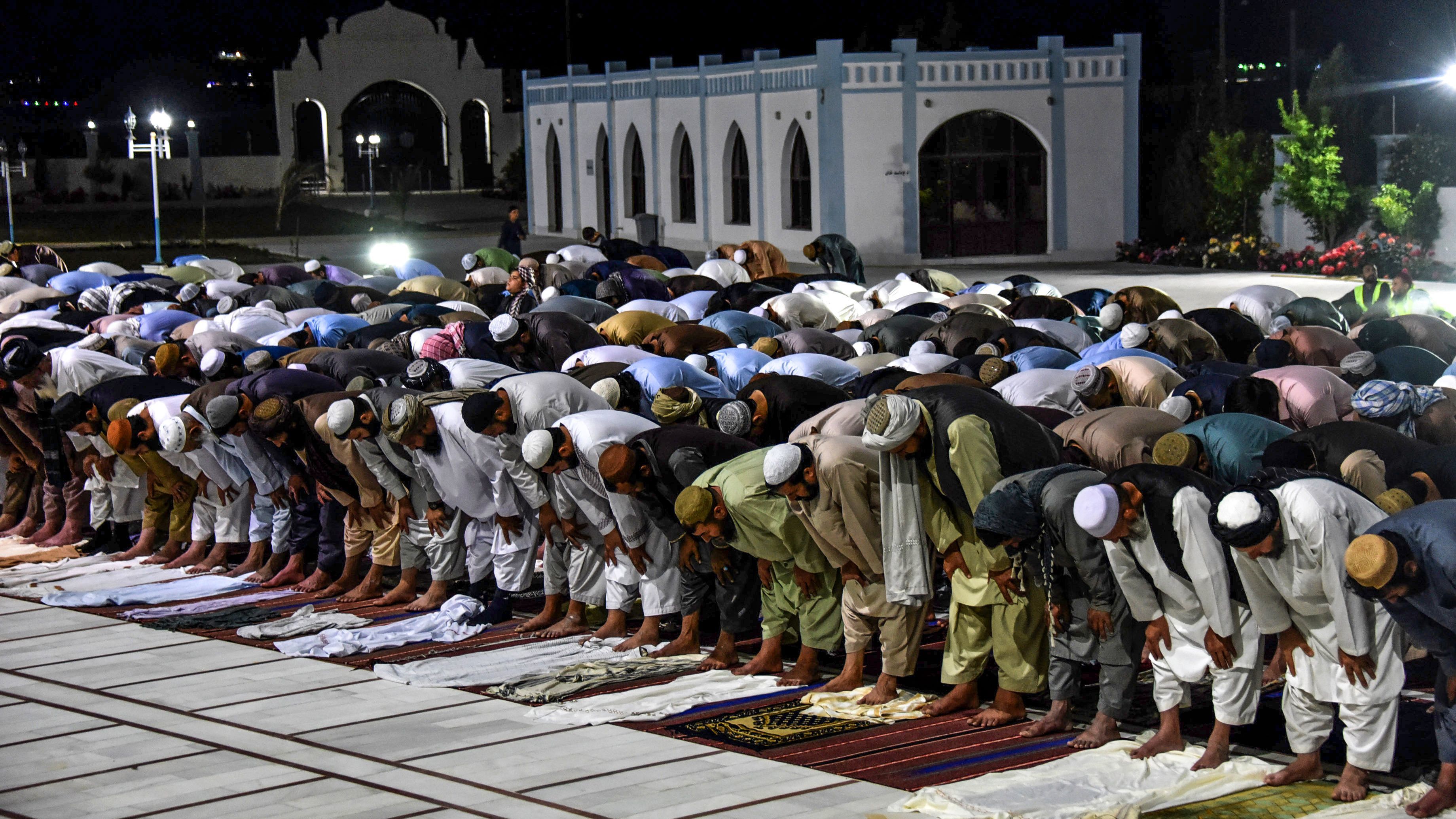 Muslims partake in evening prayers at a mosque in Kandahar, Afghanistan, in April. The Taliban have declared a cease-fire for an upcoming holiday.