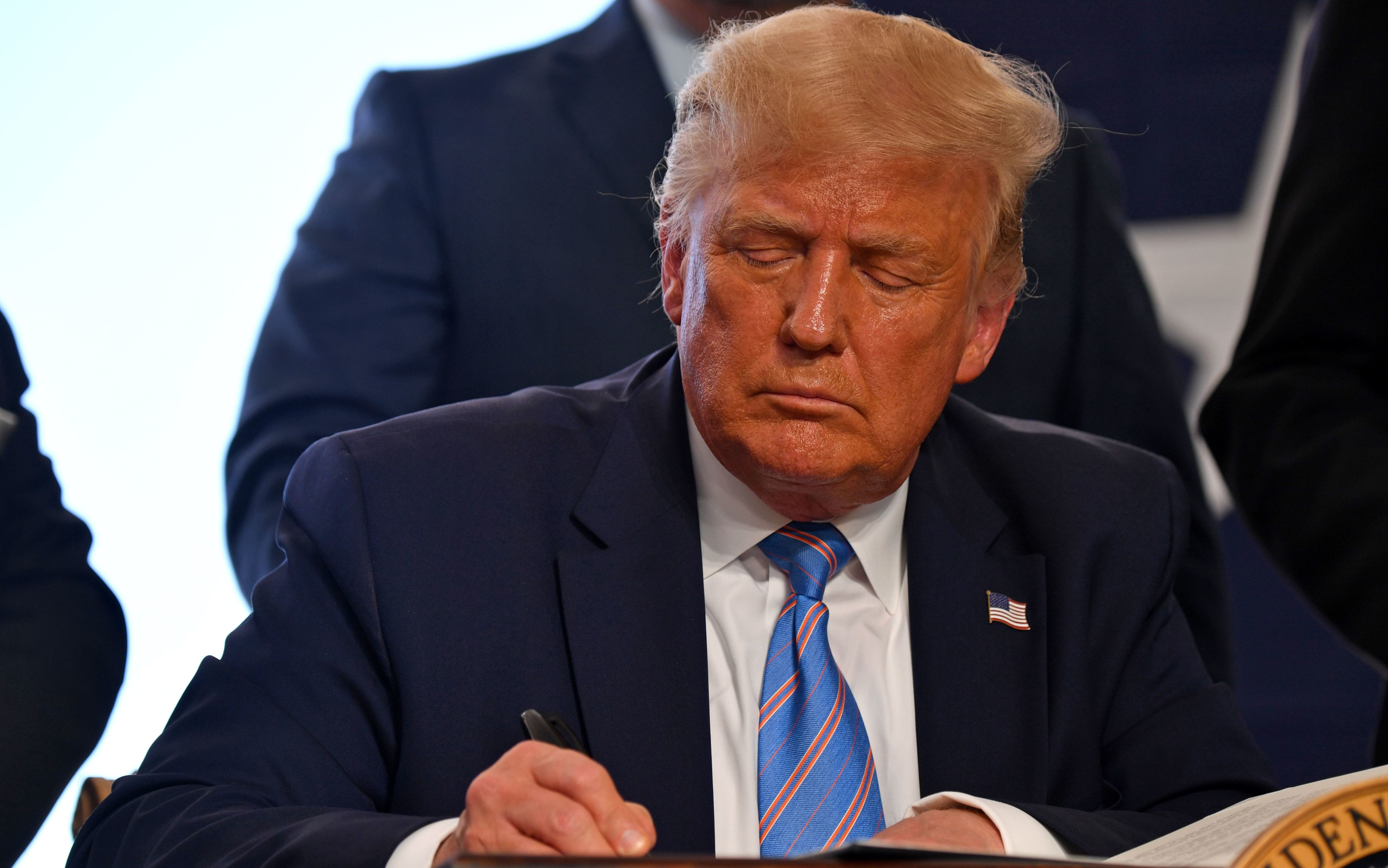 President Trump's tweet came about 15 minutes after news of the worst-ever-recorded quarterly performance of the American economy. (AFP via Getty Images)