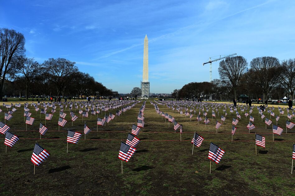 Some 1,892 American flags are installed on the National Mall in Washington, DC in 2014. The Iraq and Afghanistan veterans installed the flags to represent the 1,892 veterans and service members who committed suicide this year as part of the