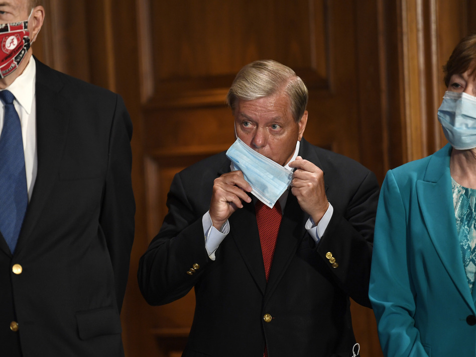 Sen. Richard Shelby, R-Ala., left, Sen. Lindsey Graham, R-S.C., center, and Sen. Susan Collins, R-Maine, at a news conference last month. Graham is re-investigating the Russia inquiry.