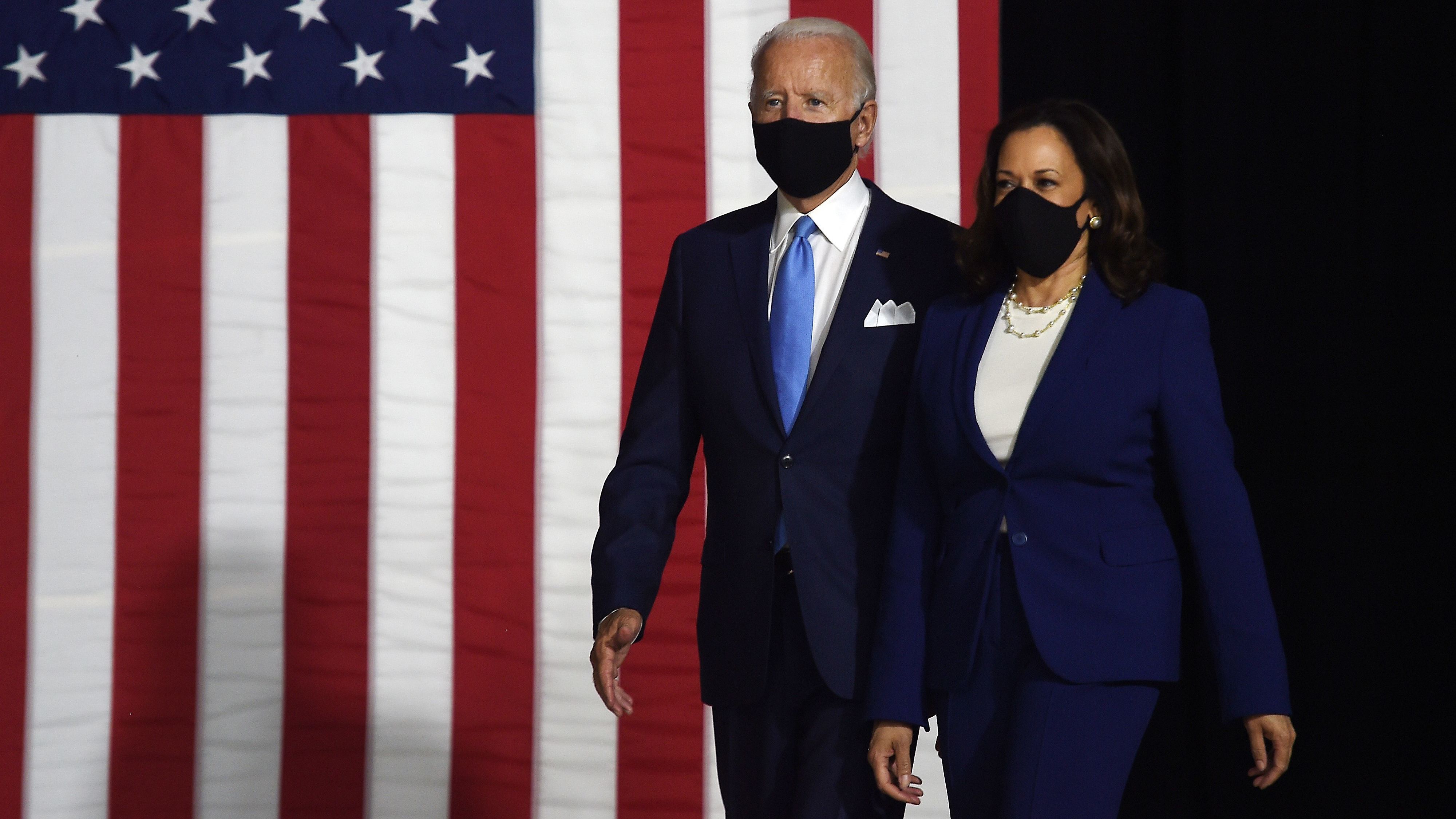 Presumptive Democratic presidential nominee Joe Biden and his vice presidential running mate, Sen. Kamala Harris, arrive to conduct their first appearance together in Wilmington, Del., on Wednesday. (AFP via Getty Images)