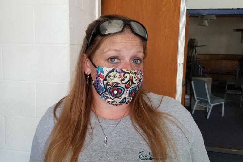 Jennifer Austin, a recovery coach who has struggled with addiction, usually hosts Narcotics Anonymous classes at this Salvation Army center in Ogdensburg, N.Y. They've been canceled because of the pandemic, leaving more people vulnerable to relapse and overdose. "I've had people I've never worked with before reach out to me and say, 'Jen, what do I do?'" Austin said. (Brian Mann/NPR)