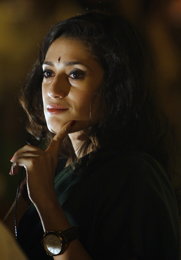 Fatima Bhutto says it was "totally terrifying" to go through airport security with her laptop full of research material for The Runaways. "You know, 'I'm writing a novel' is kind of like 'my dog ate my homework,' I think, at an airport," she says. Bhutto is pictured above in New Delhi in April 2010.