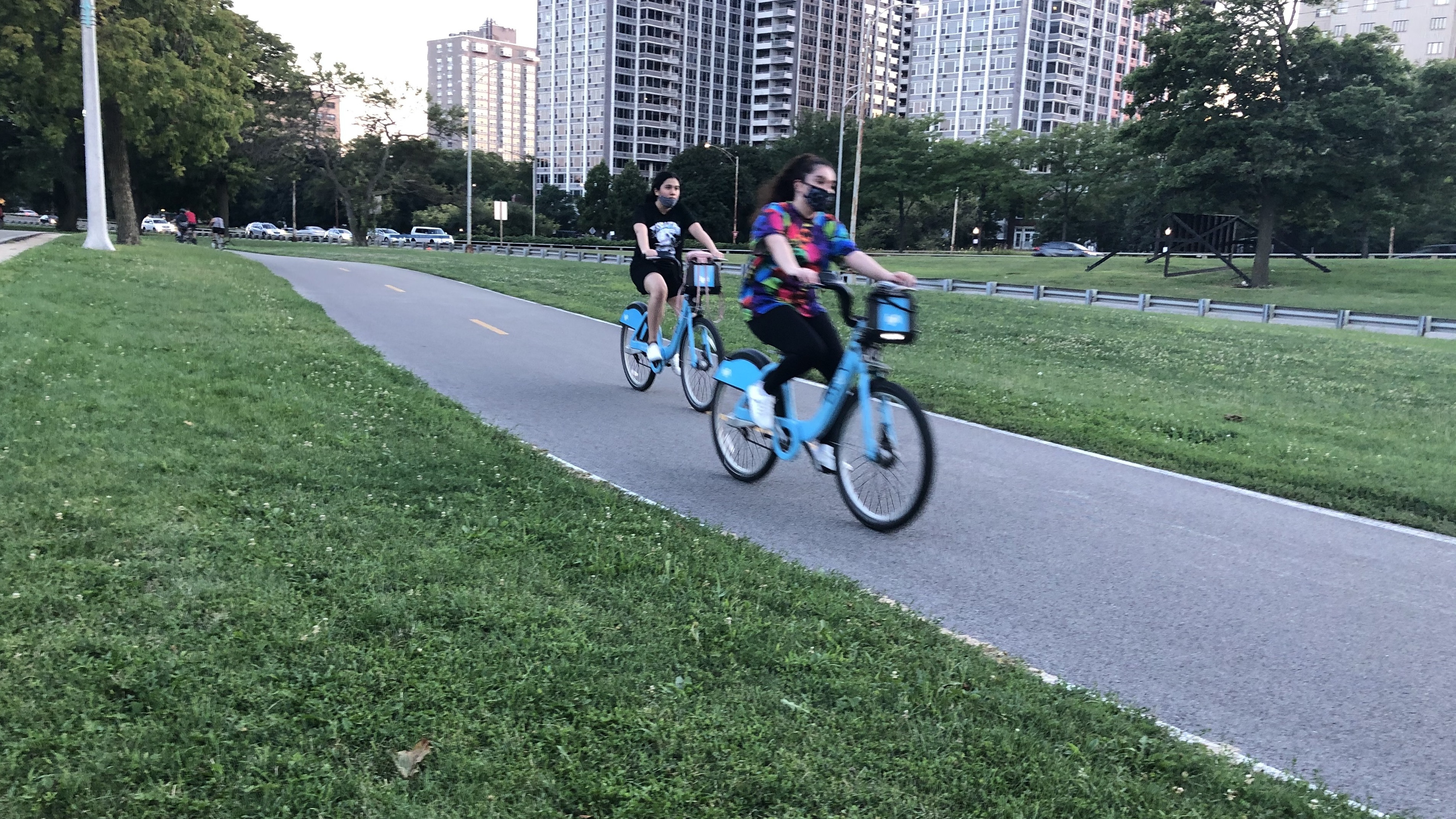 Cyclists enjoy a ride on Chicago's Lakefront Trail on a recent evening. Biking there and all across the country is up significantly during the pandemic. (NPR)