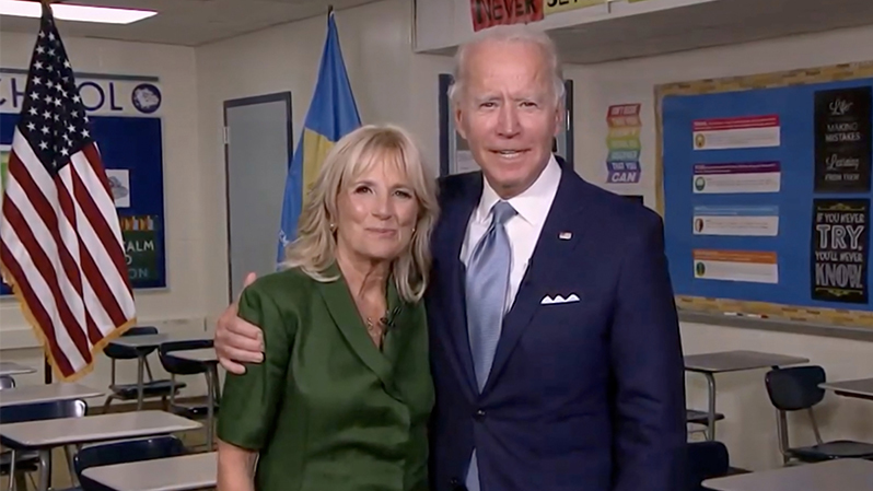 Democratic presidential nominee Joe Biden joins his wife Jill Biden in a classroom after her address to the virtual Democratic National Convention on Tuesday. (Screenshot of DNCC livestream via Getty Images)