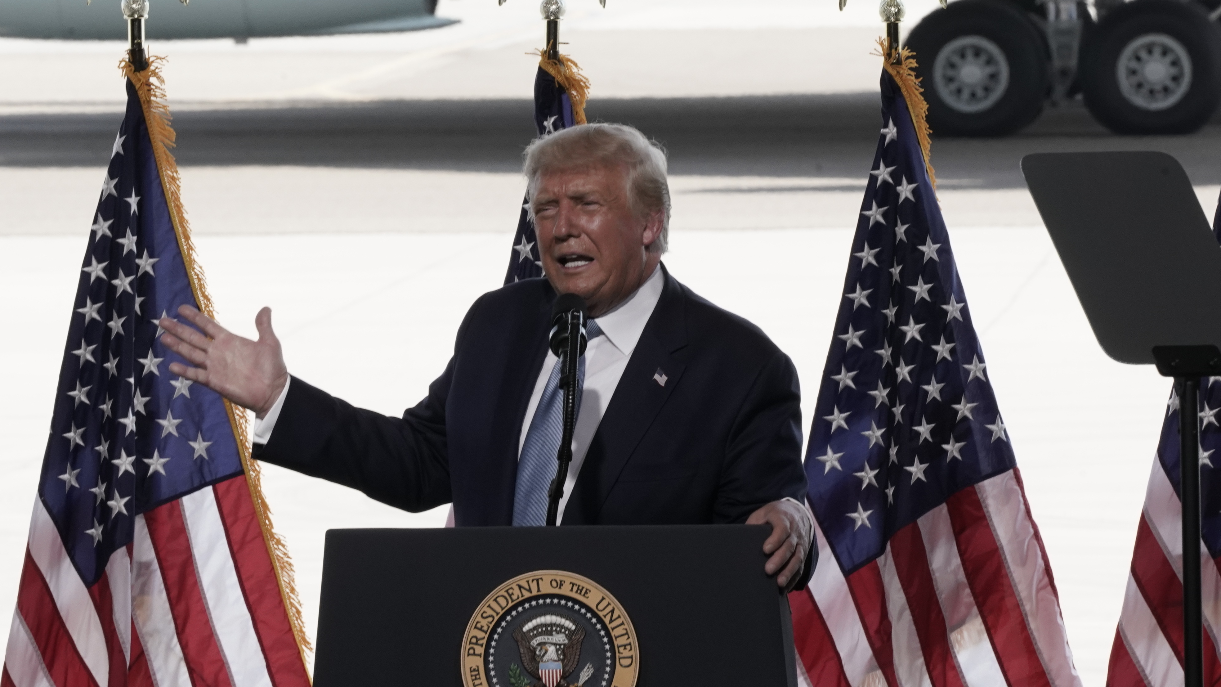 President Trump addresses a campaign rally Tuesday at Yuma International Airport in Arizona. (Bloomberg via Getty Images)