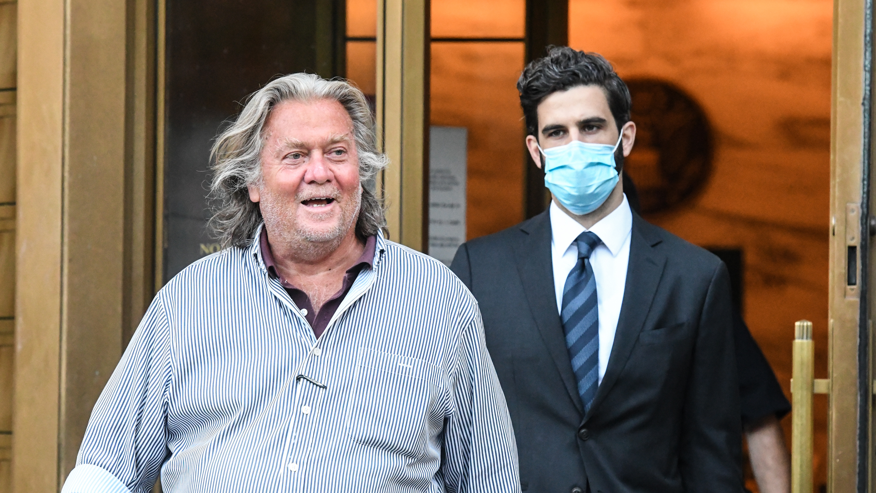 Former White House adviser Steve Bannon exits the Manhattan Federal Court on Thursday. Bannon and three other defendants have been indicted for allegedly defrauding donors in a $25 million border wall fundraising campaign. Bannon joins a list of 2016 Trump campaign officials who have faced federal charges.