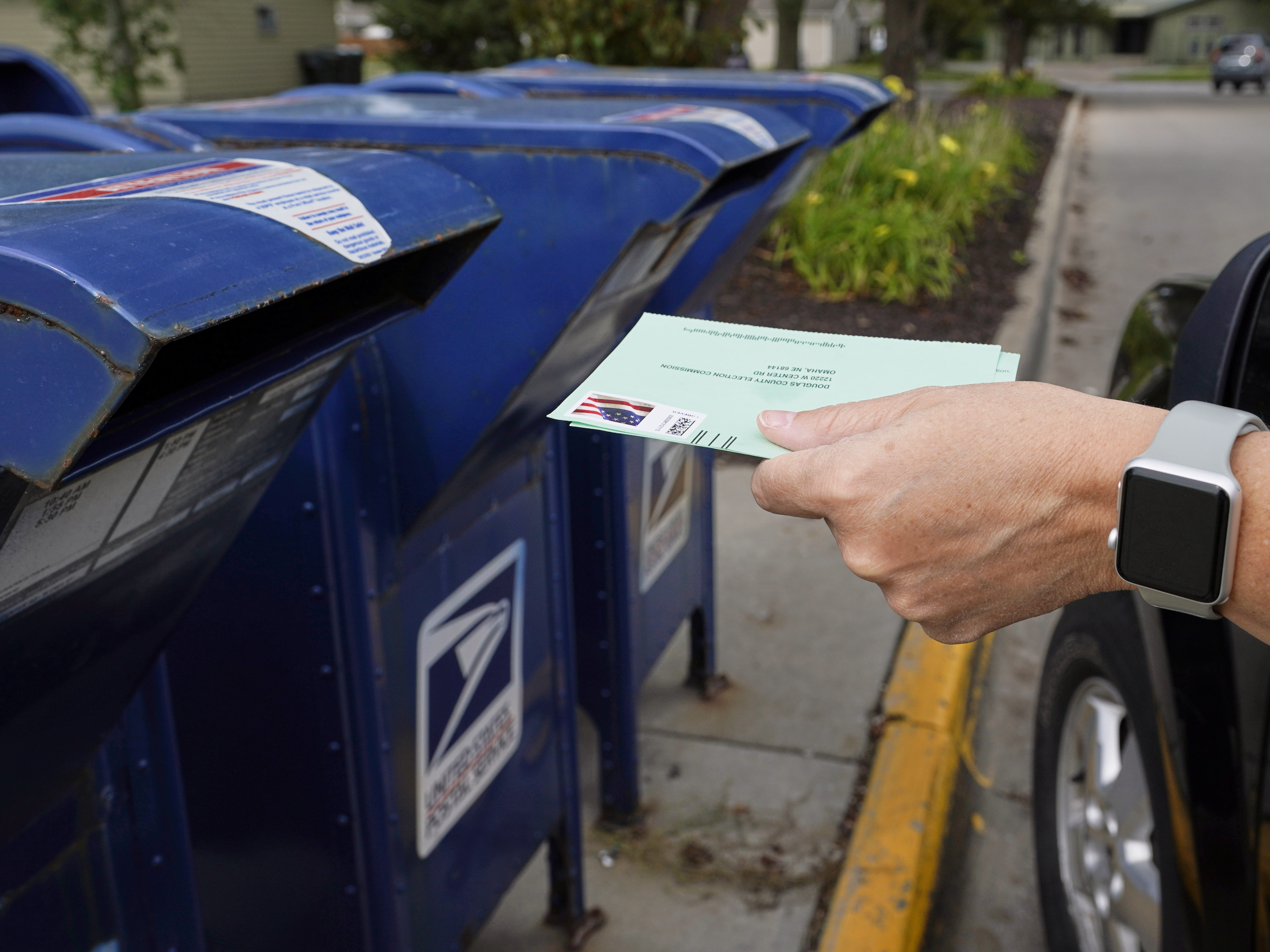 House approves bill that blocks changes at Postal Service until after the election