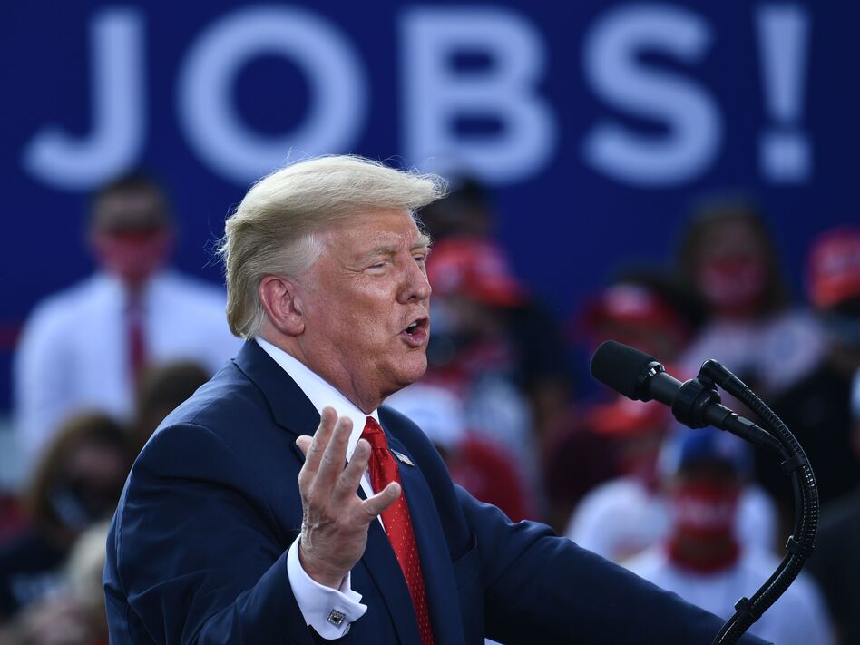 President Trump delivers remarks on the economy in Oshkosh, Wis., on Aug. 17. (Brendan Smialowski/AFP via Getty Images)