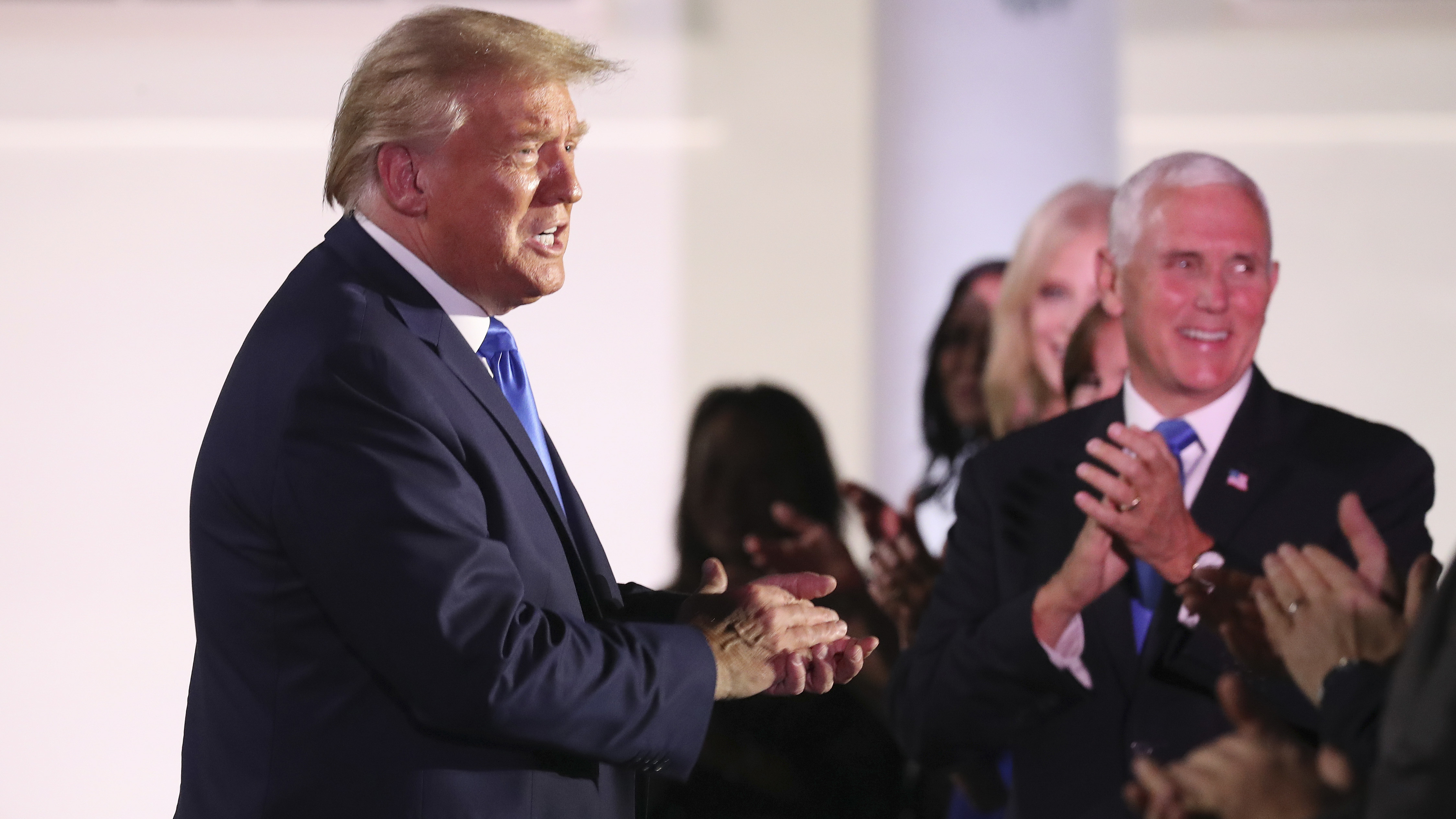 President Trump arrives at the Rose Garden of the White House during the Republican National Convention on Tuesday. (Bloomberg via Getty Images)