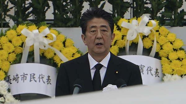 Japanese Prime Minister Shinzo Abe speaks during a ceremony at the Hiroshima Peace Memorial Park on Aug. 6 to mark the 75th anniversary of the U.S. atomic attack. Abe announced his resignation Thursday.