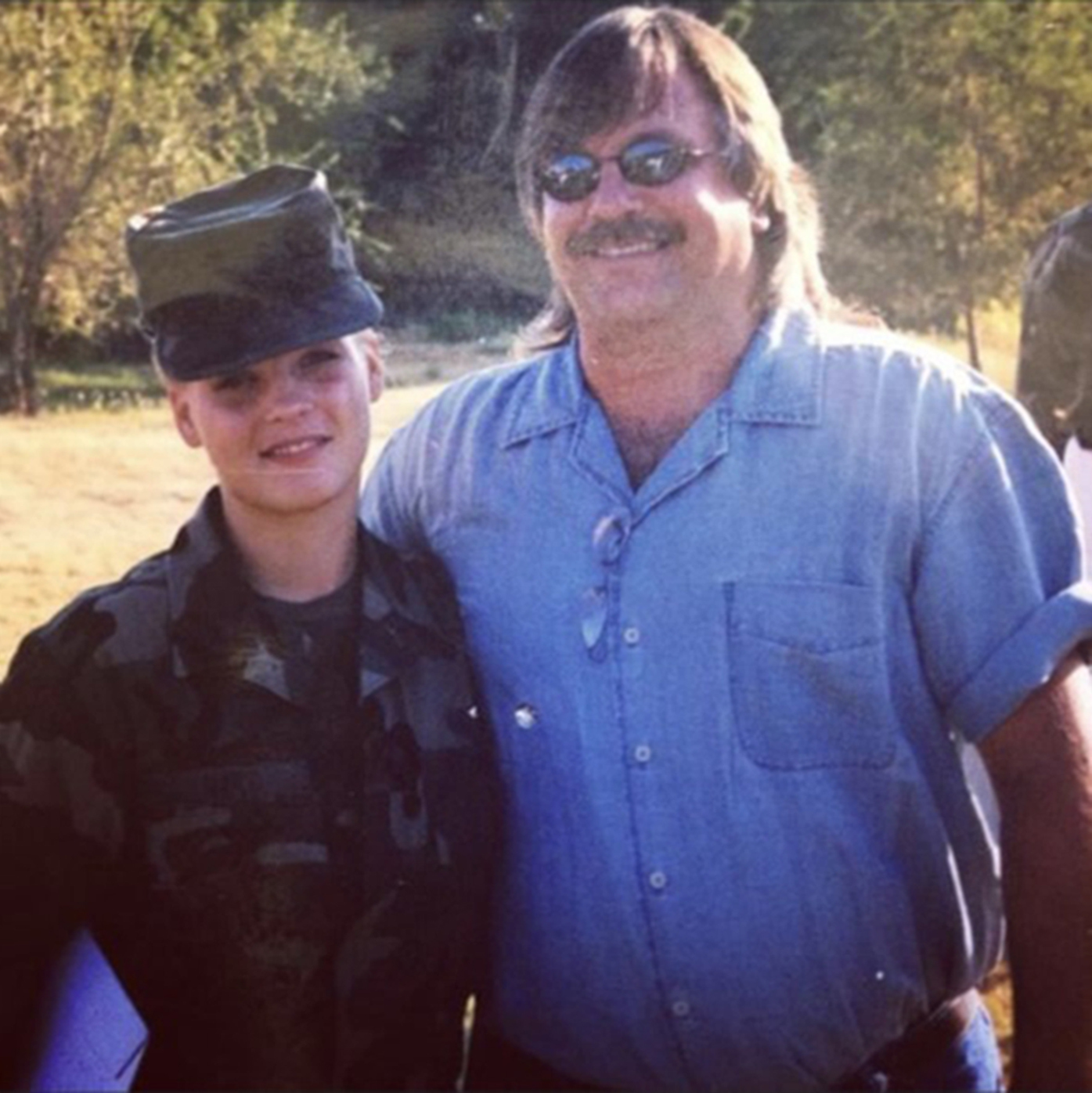 Opinion: Public Health Leaders Deserve More Respect 1 Angela Hart served eight years in the U.S. Army Reserve, including more than one year on active duty in Iraq. She is shown here with her father, Alan Hart, in Fort Sill, Okla., the day she graduated from basic training in 2000.